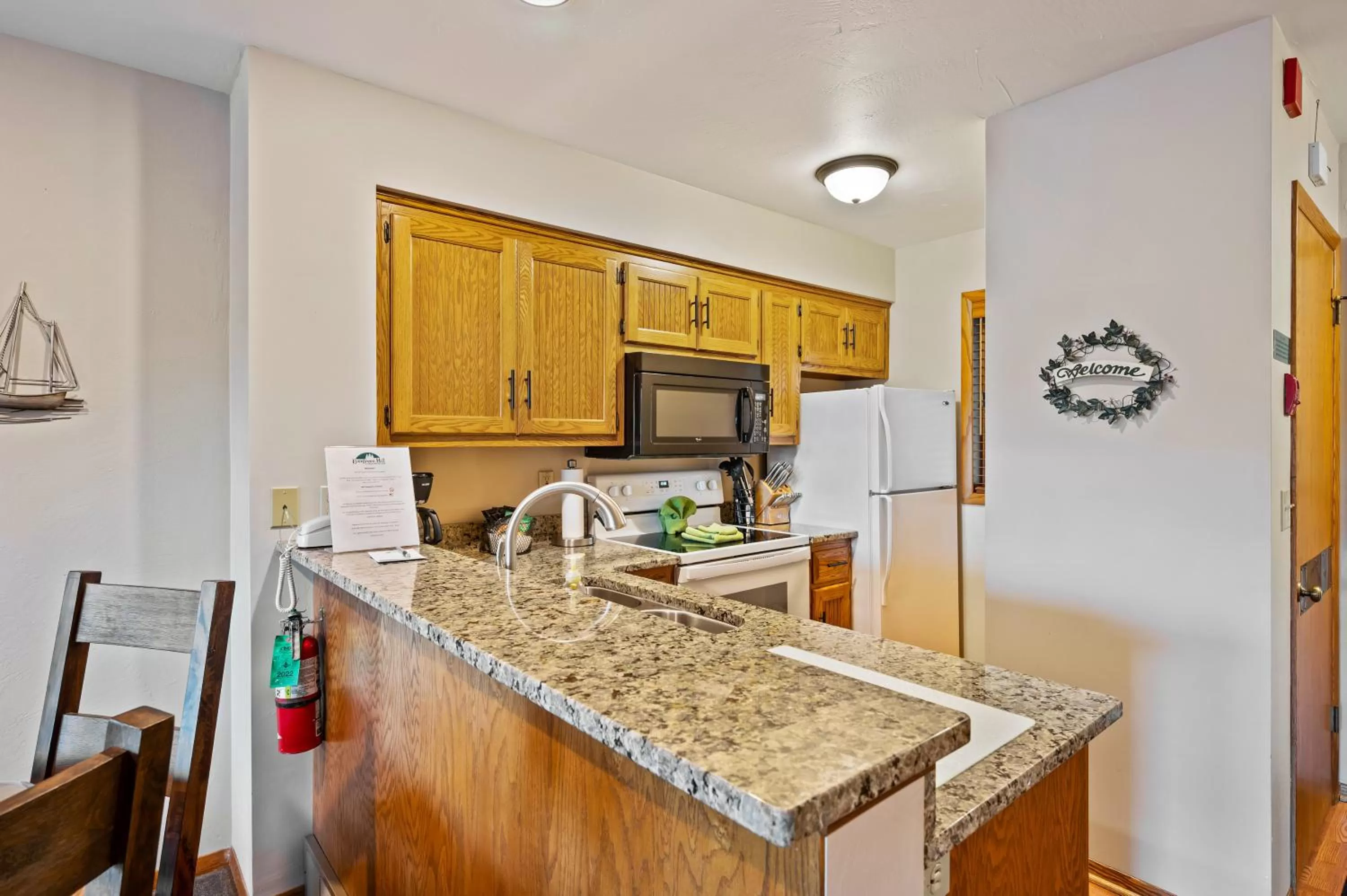 Kitchen or kitchenette in Evergreen Hill Condominiums