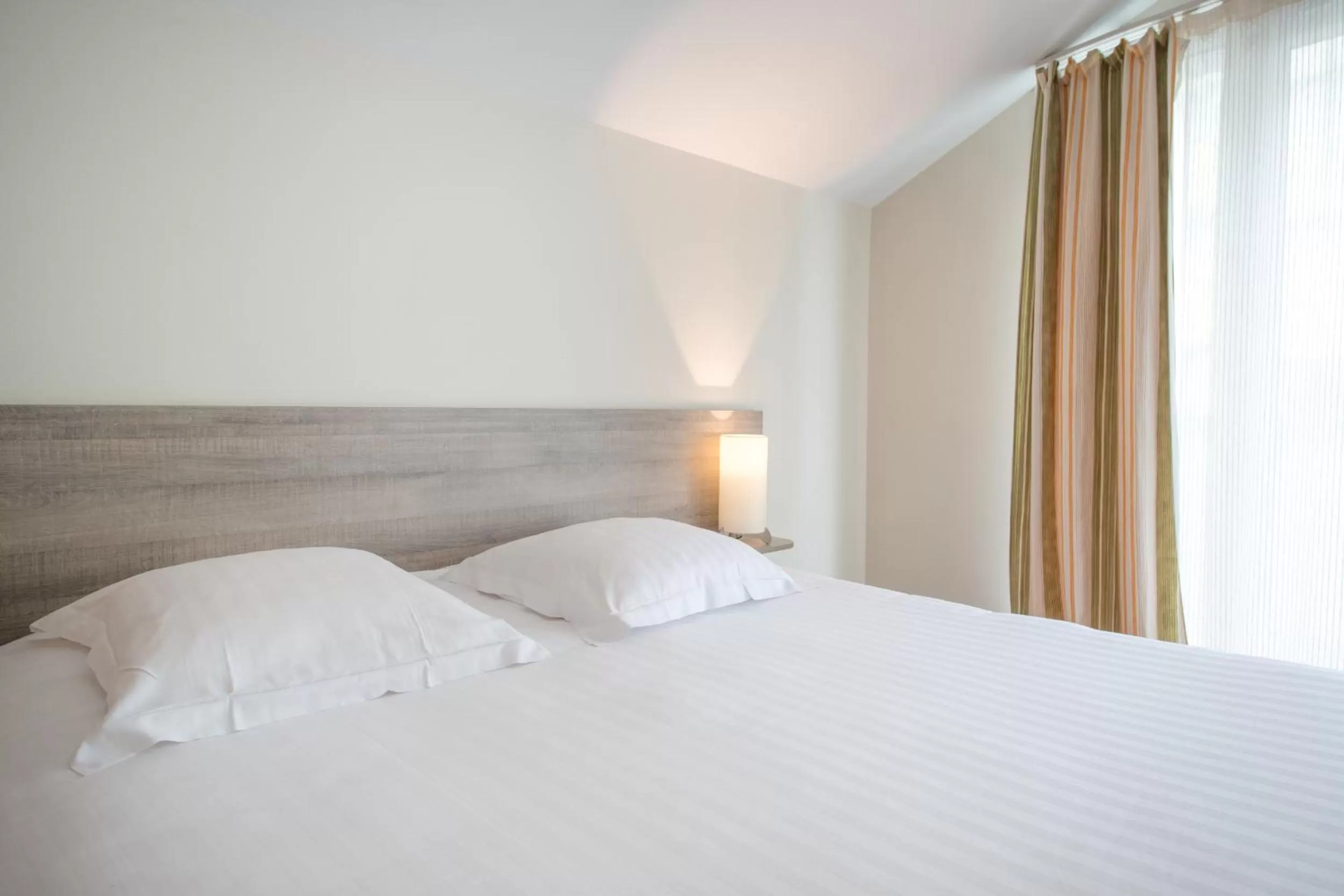 Bed in Comfort Aparthotel Saint-Nazaire Les Portes de l Ocean