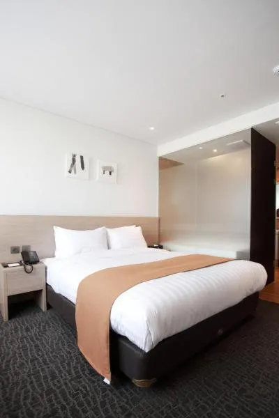 Bed in Gangneung City Hotel