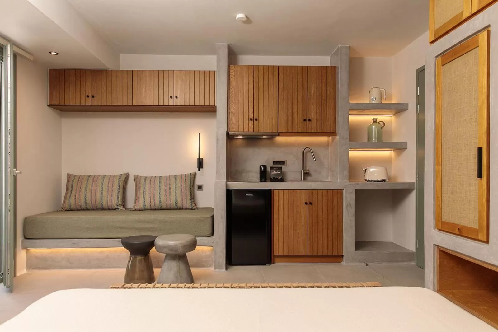 Bed in "Makava Suites" Your Luxe Urban Sanctuary