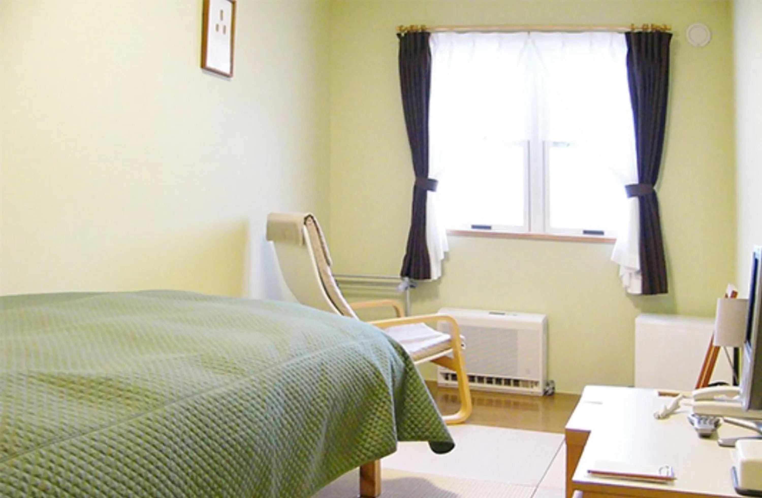 Decorative detail, Bed in Hotel Resort Inn Niseko