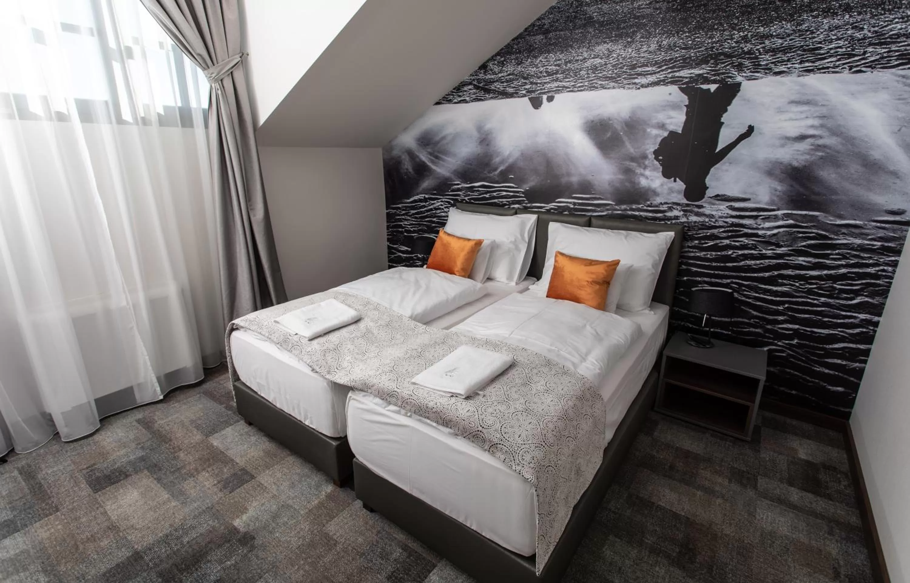 Bed in Artis Boutique Hotel