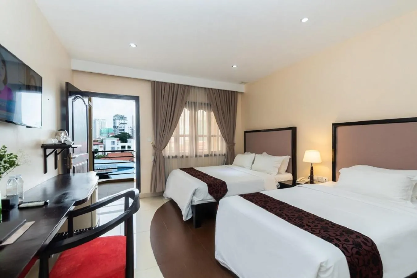 Photo of the whole room, Bed in Almond Hotel Sothearos