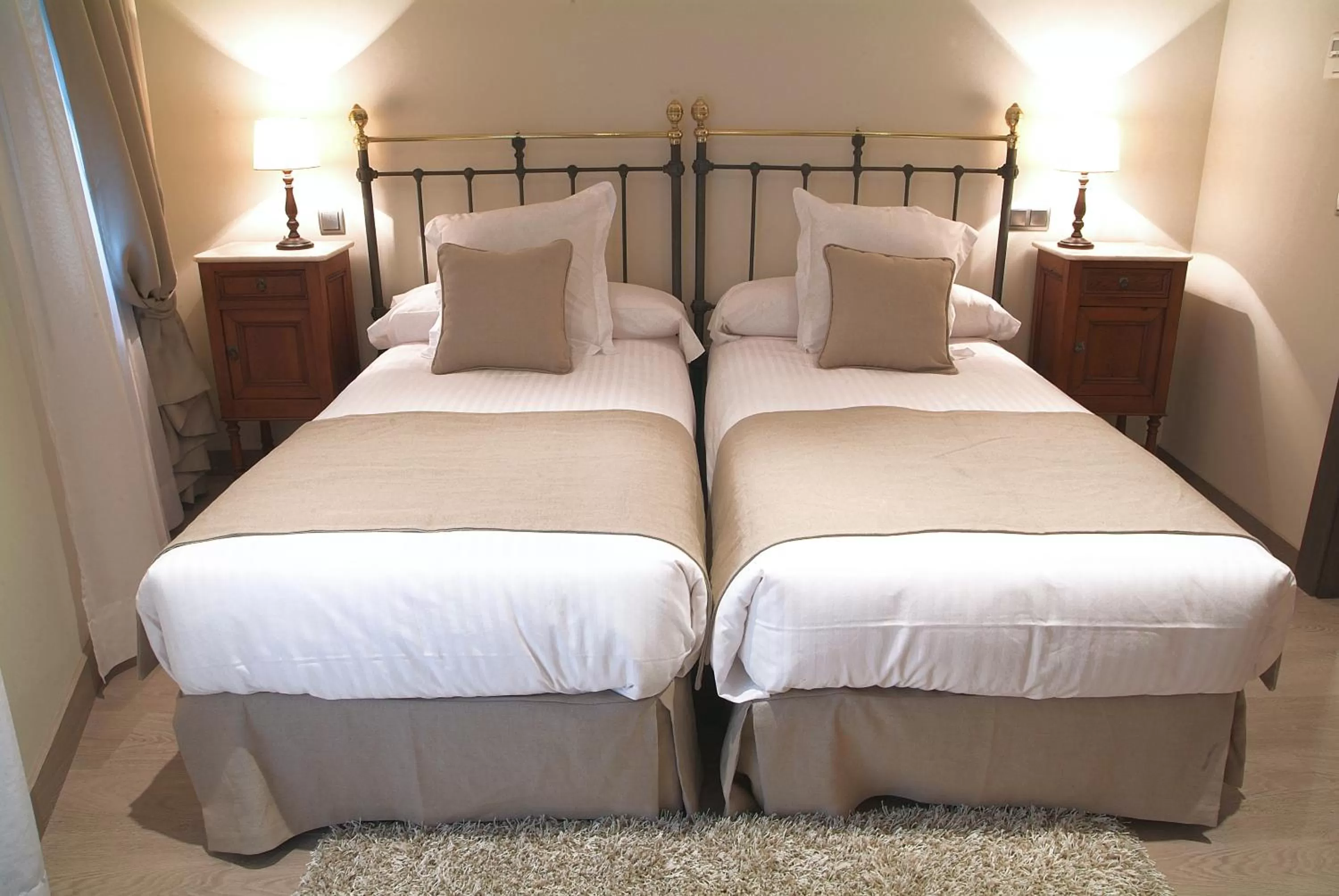 Bed in Le Petit Boutique Hotel