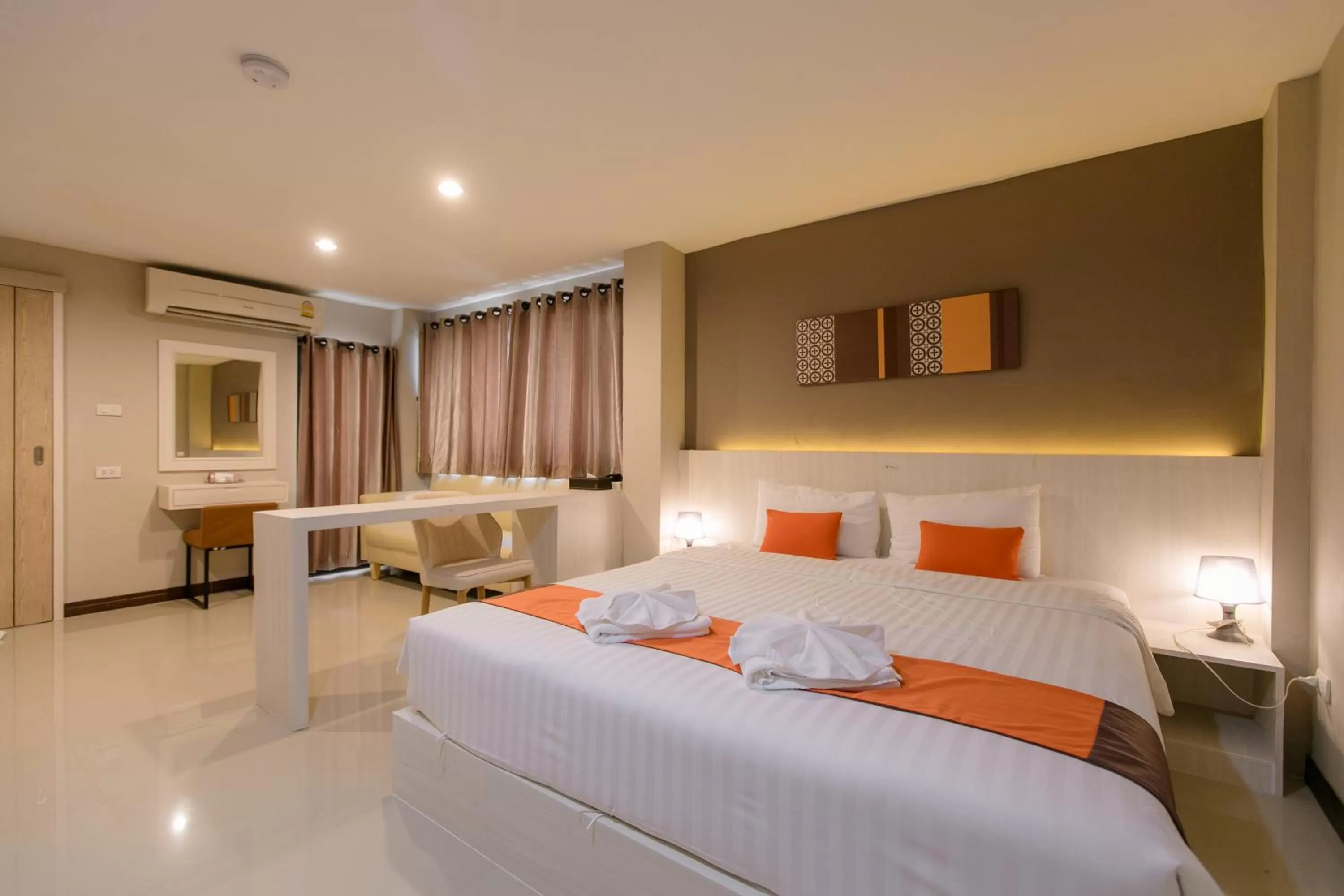 Seating area, Bed in De Hug Hotel & Residence