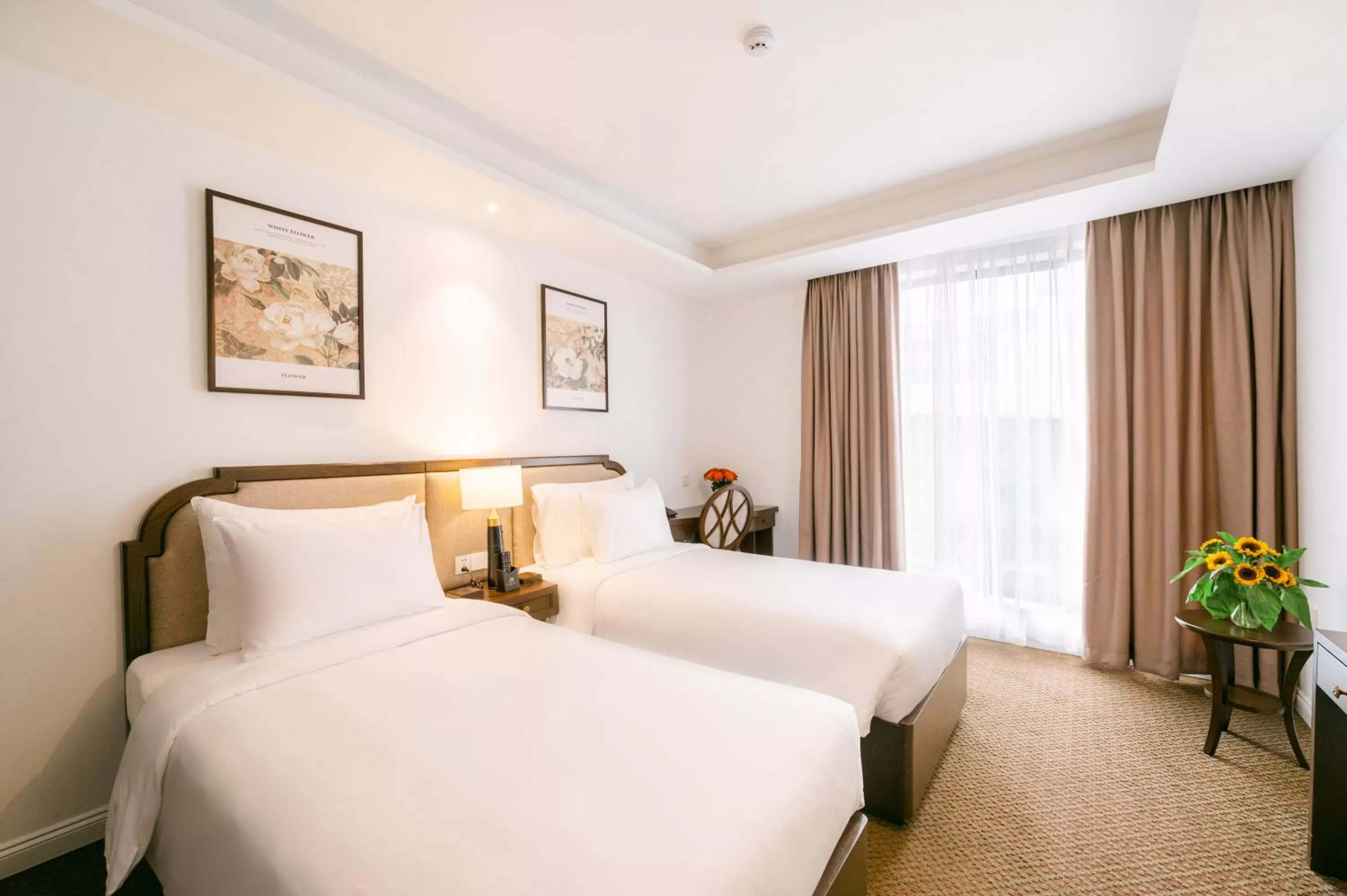 Photo of the whole room, Bed in Marigold Hotel Hanoi