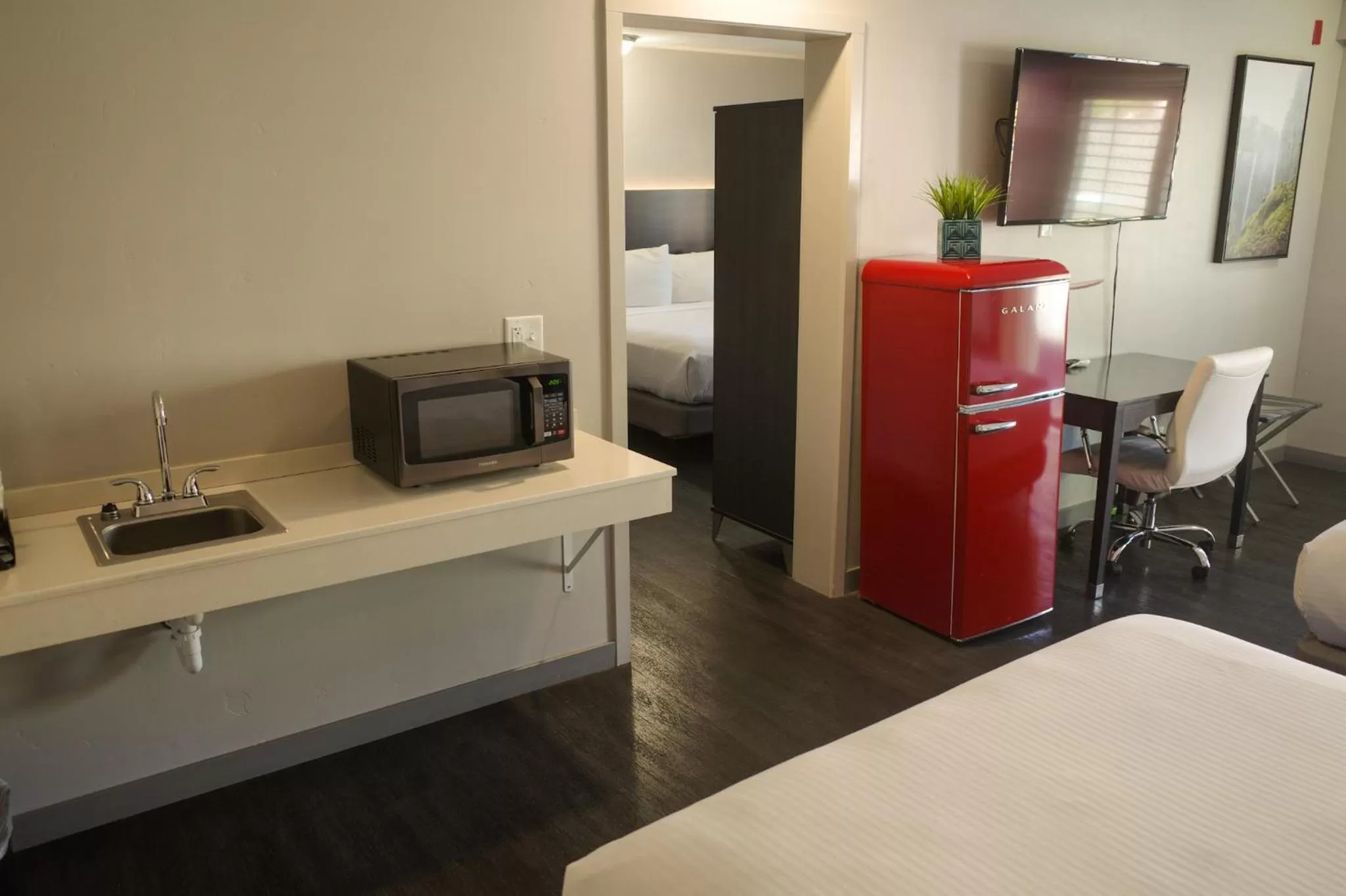 Bed in Americana Modern Hotel