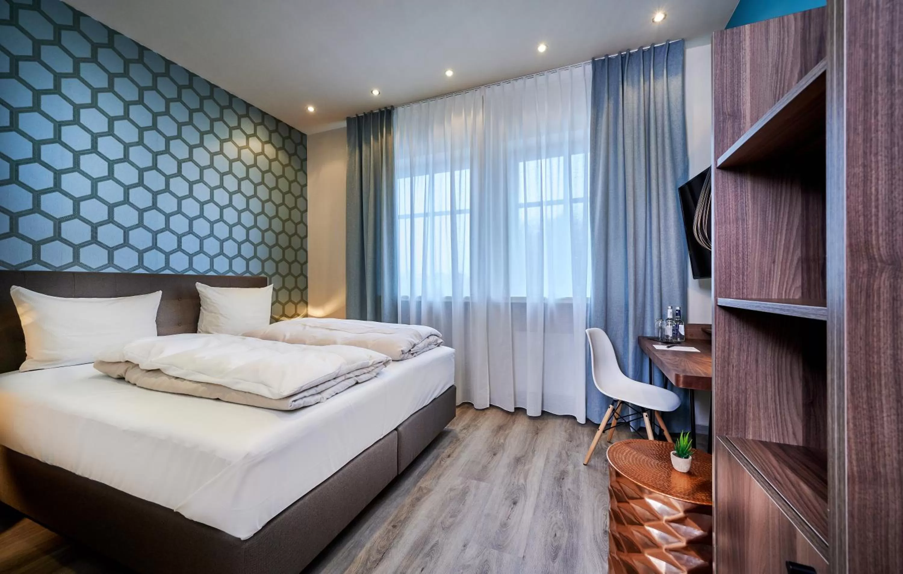 Bed in Genusshotel Wenisch