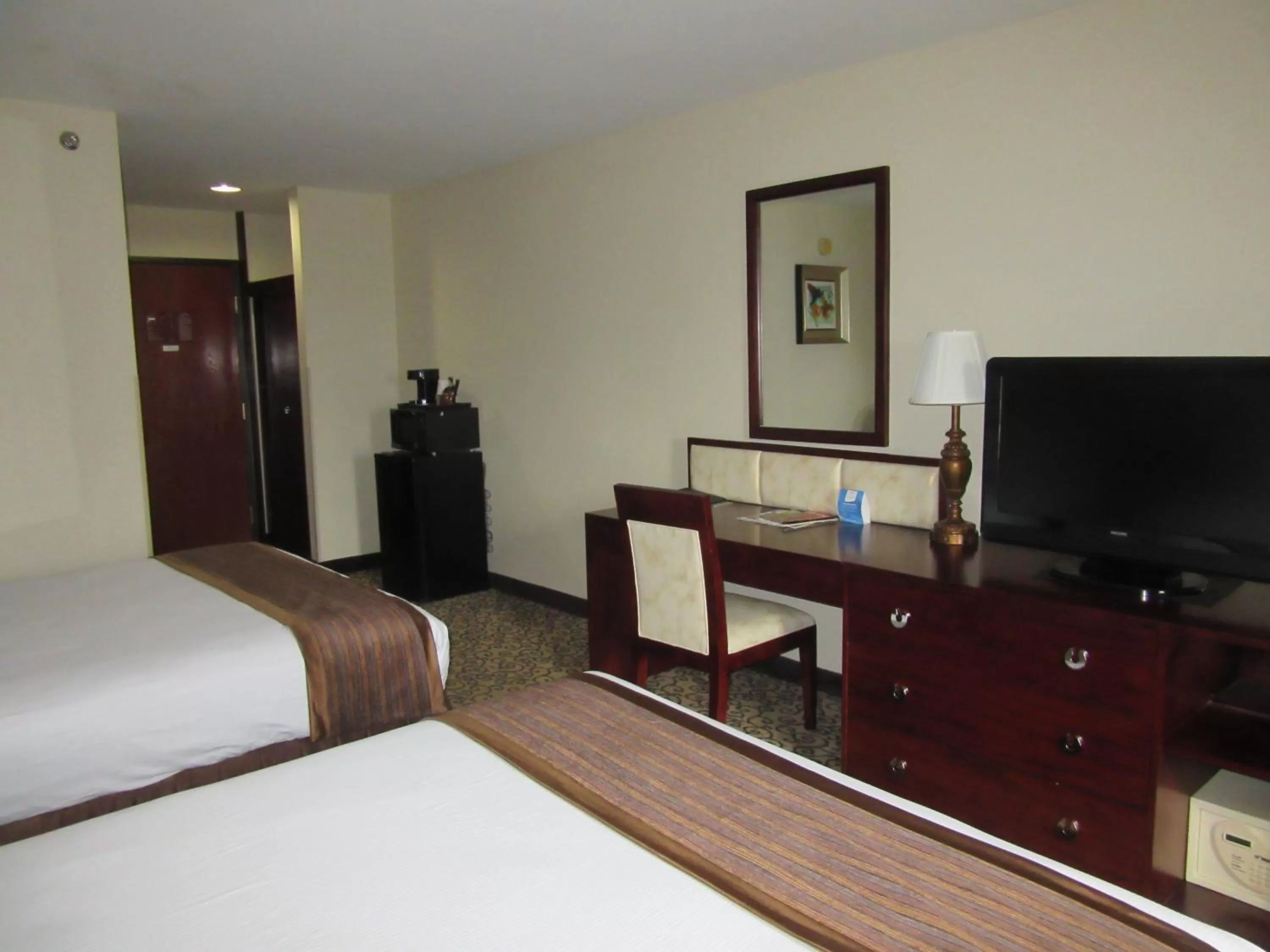 Decorative detail, Bed in Baymont by Wyndham Columbia Fort Jackson