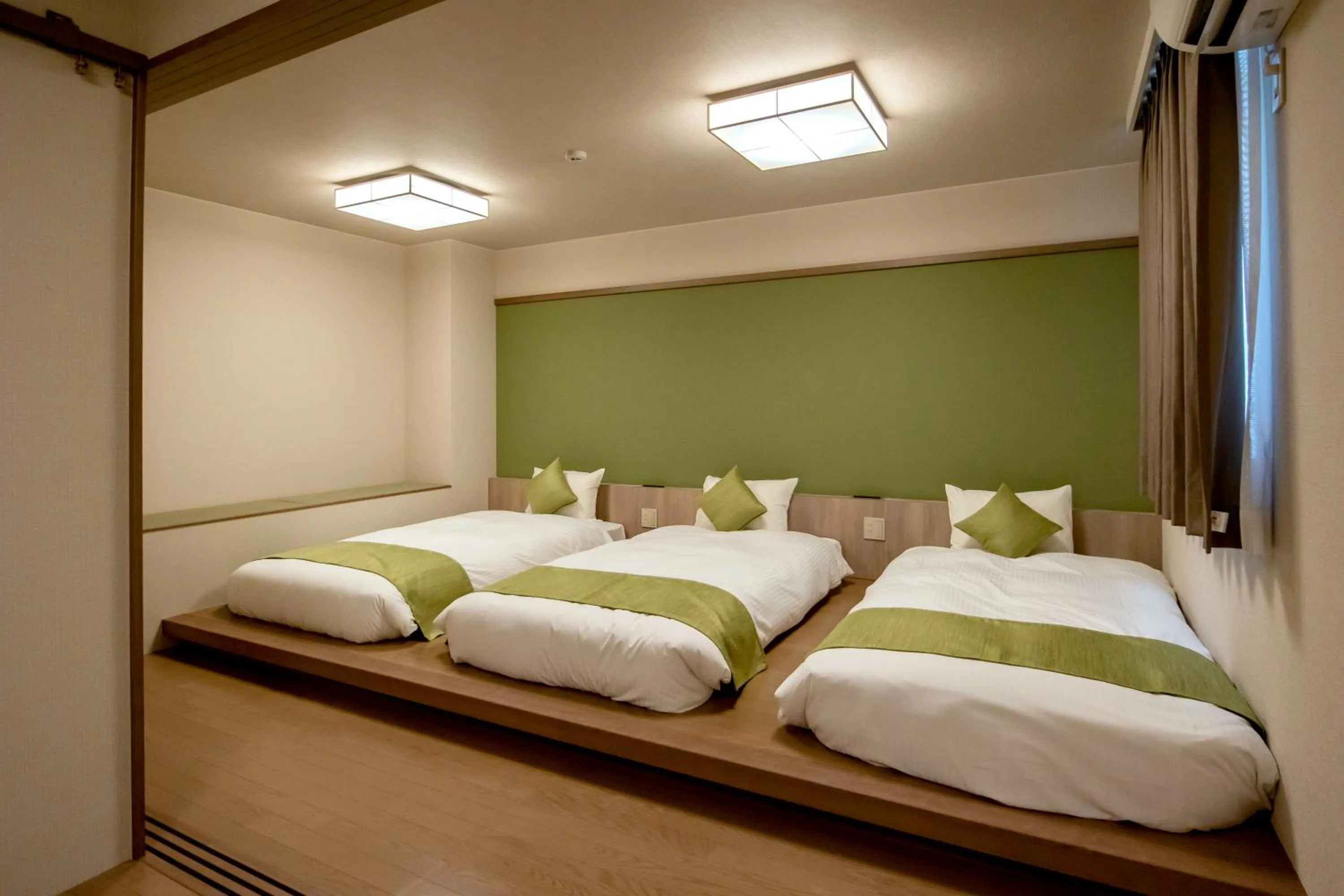 Photo of the whole room, Bed in Hotel Lantana Naha Matsuyama