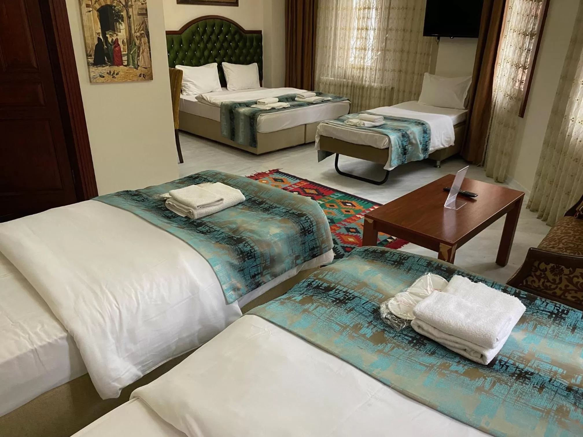 Photo of the whole room, Bed in Atam Suites