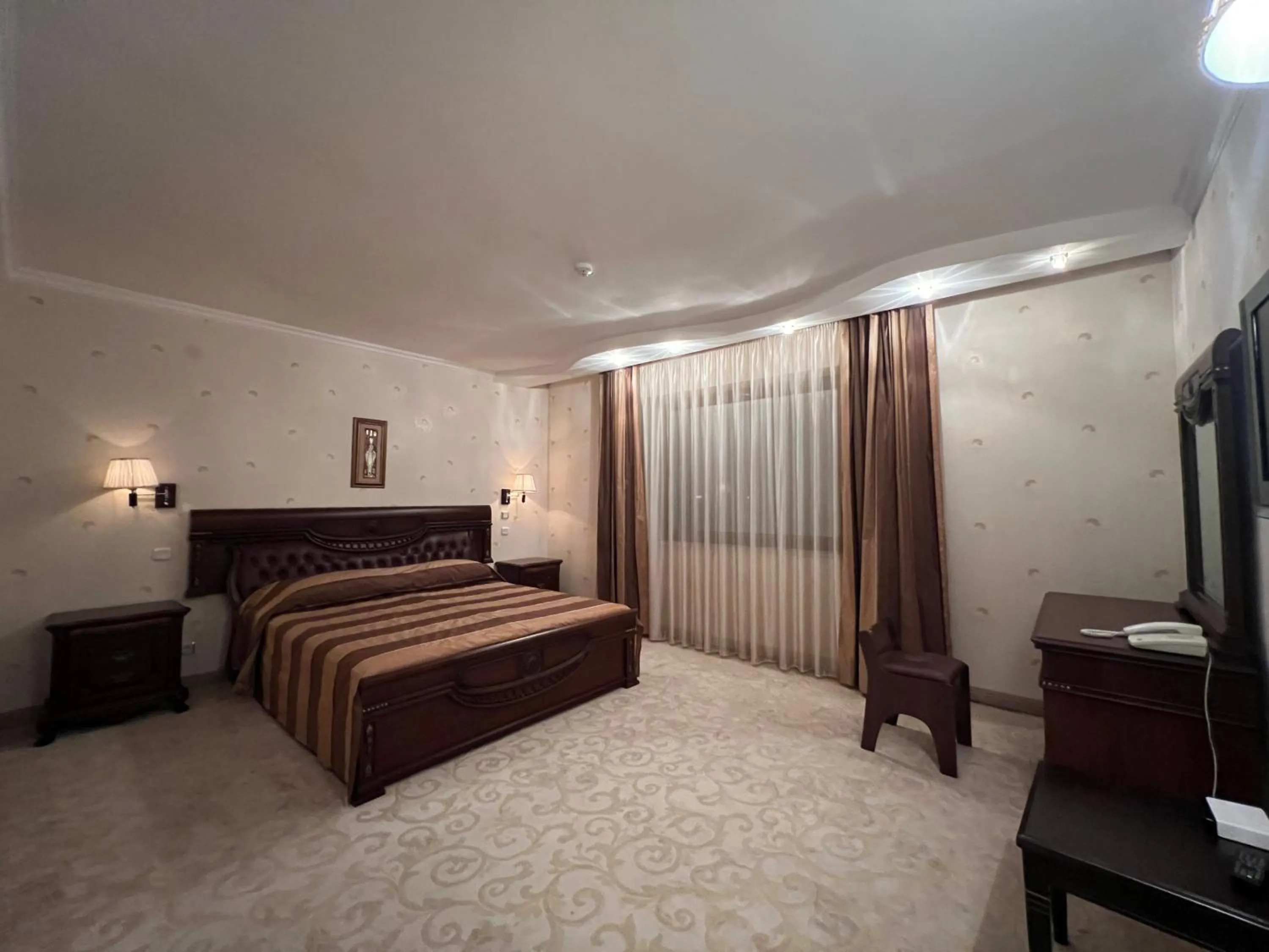 Bed in Merian Palace Hotel