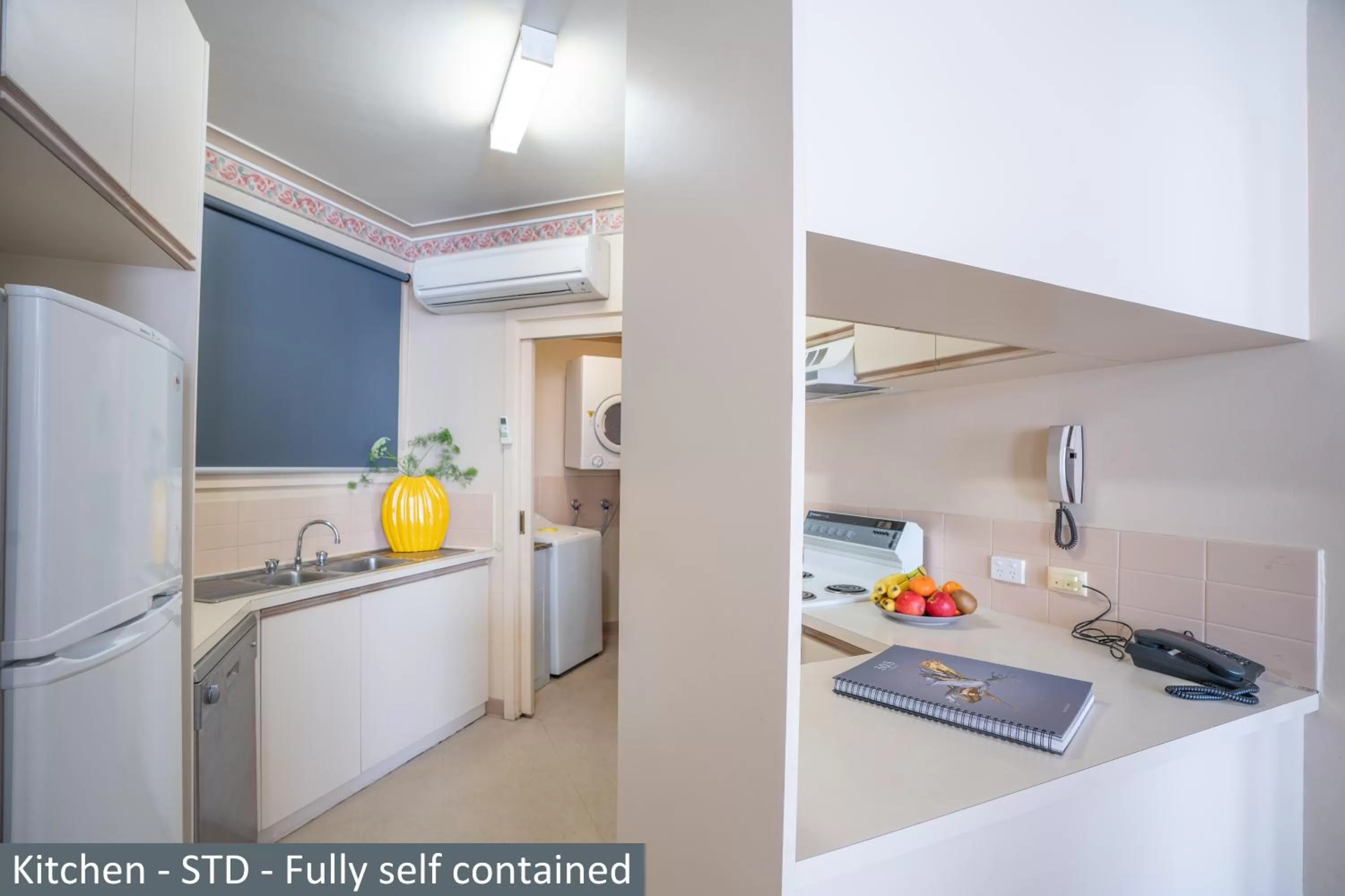 Kitchen or kitchenette in Clocktower Apartment Hotel