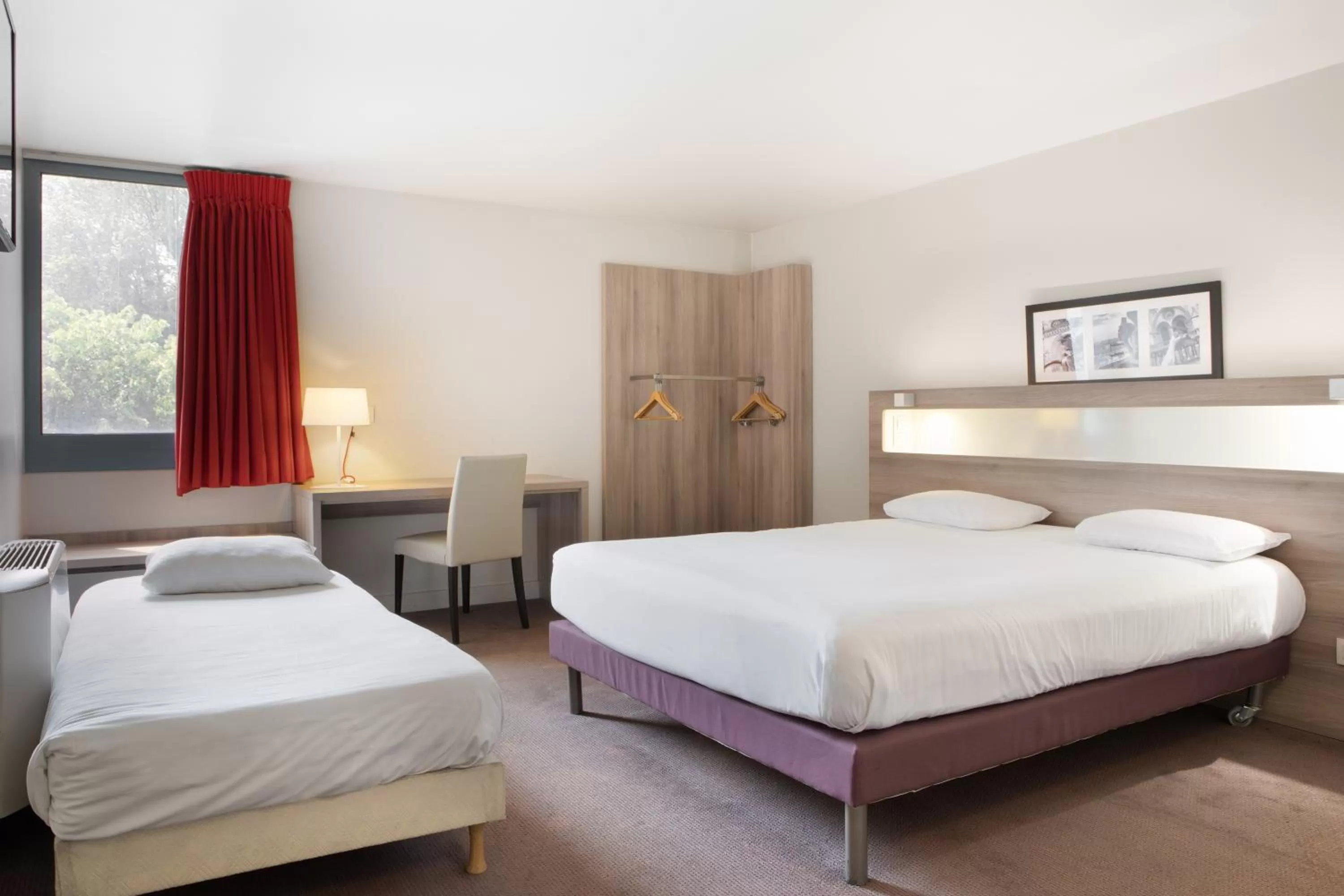 Photo of the whole room, Bed in Kyriad Paris Est - Bois de Vincennes