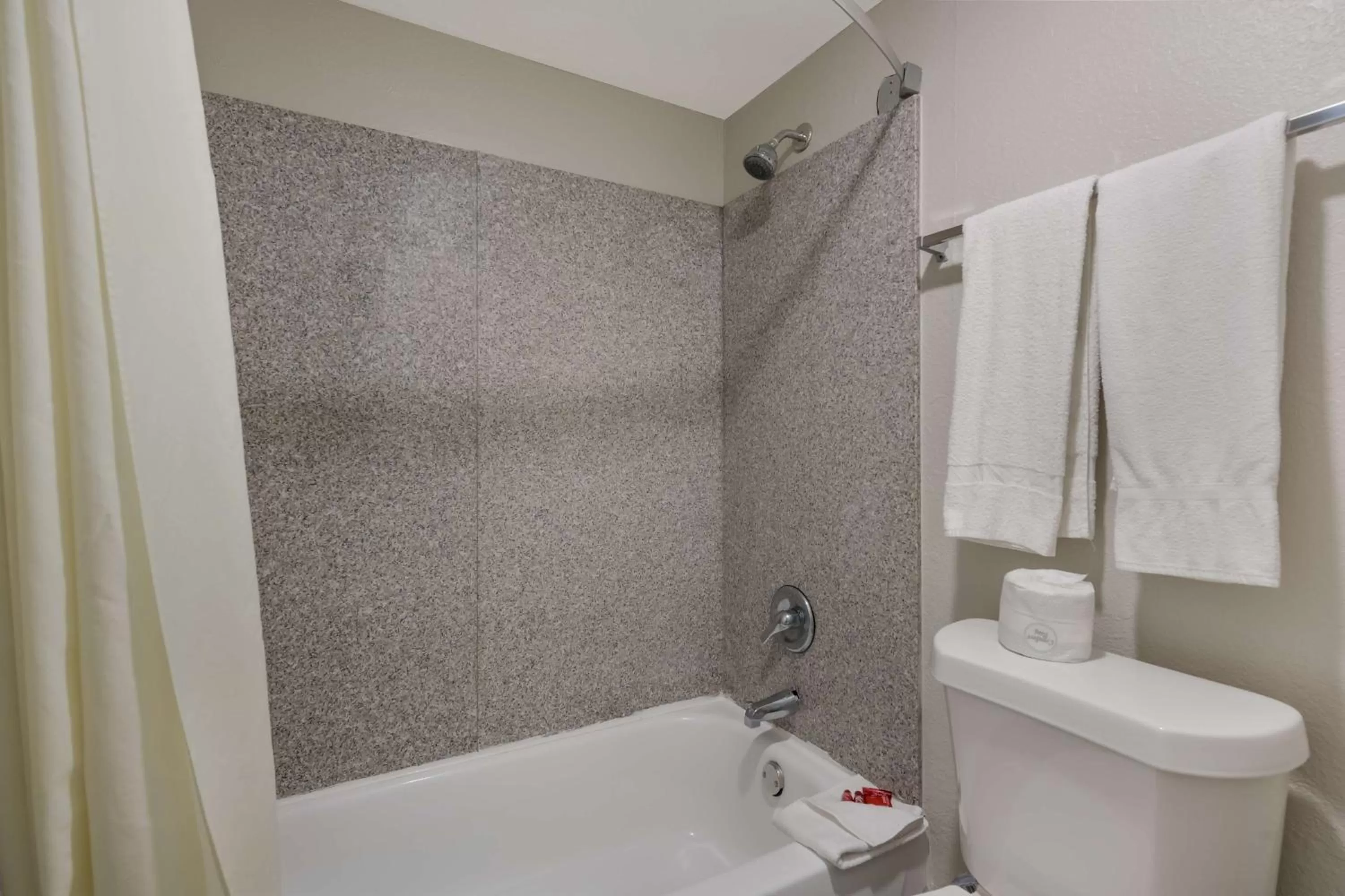Bathroom in SureStay Hotel by Best Western Spring North Houston