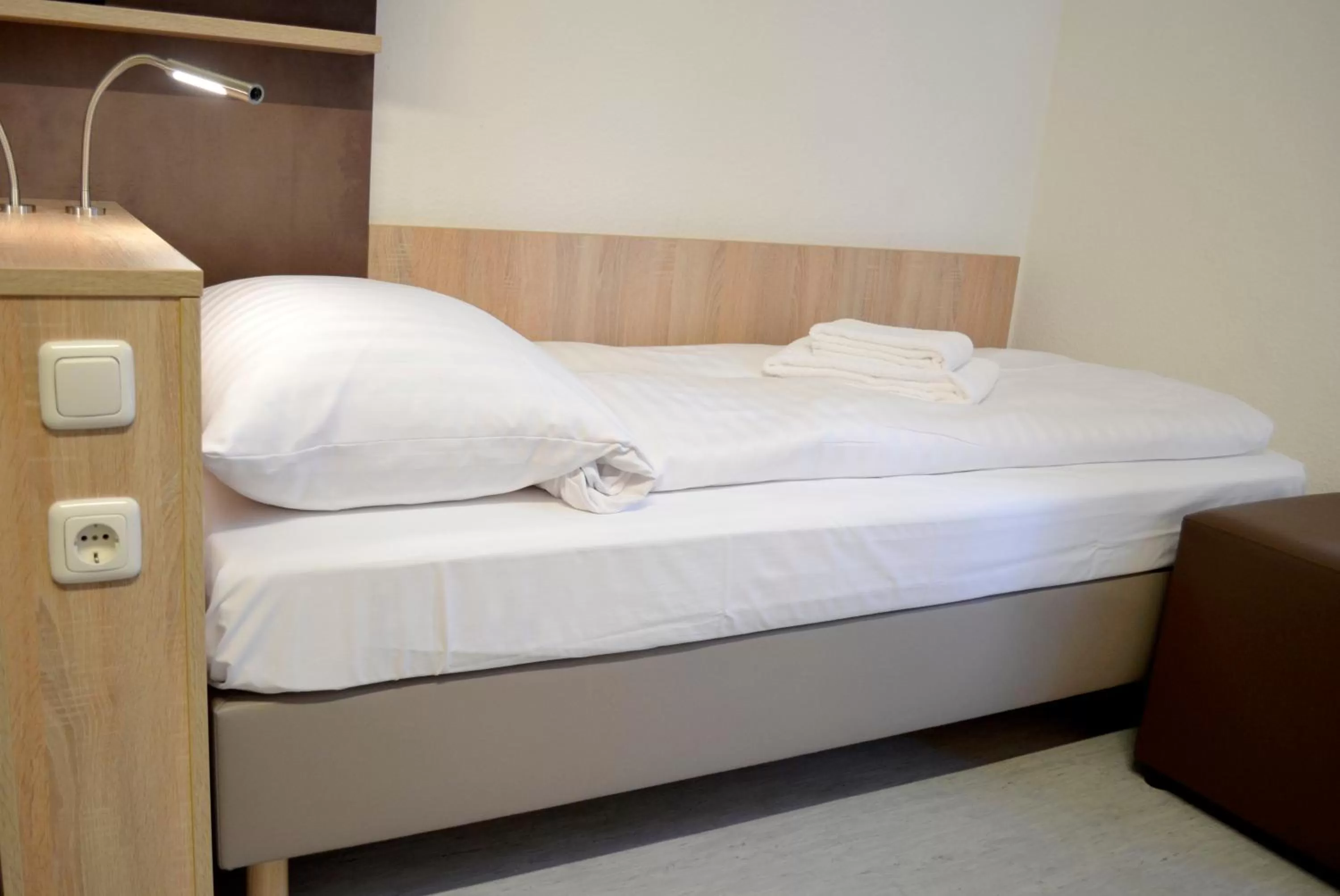 Bed in Hana Aparthotel