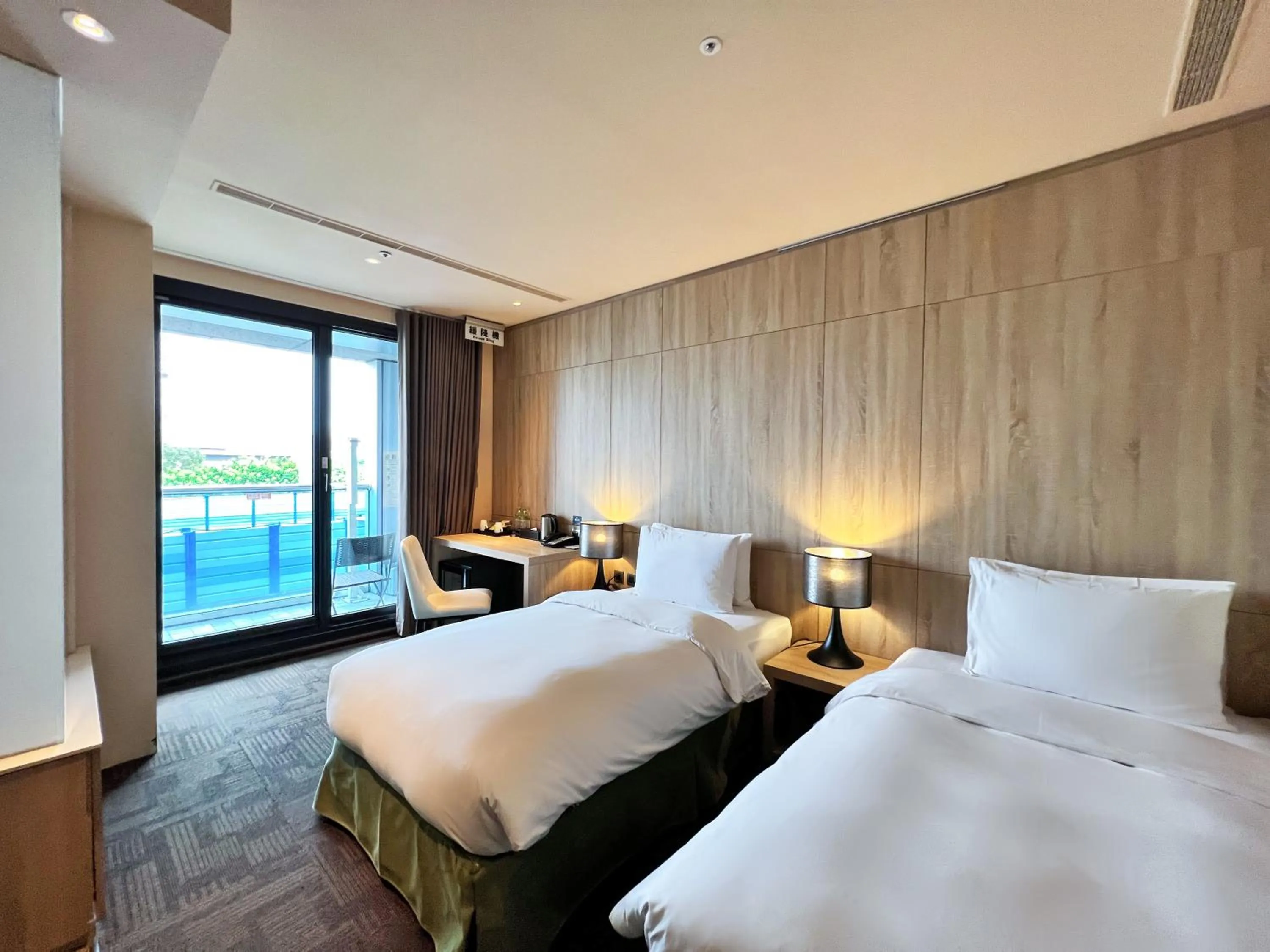 Bed in Wallsun Hotel