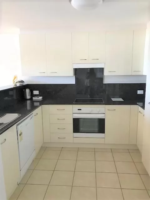 Kitchen/Kitchenette in Sunrise Luxury Apartments