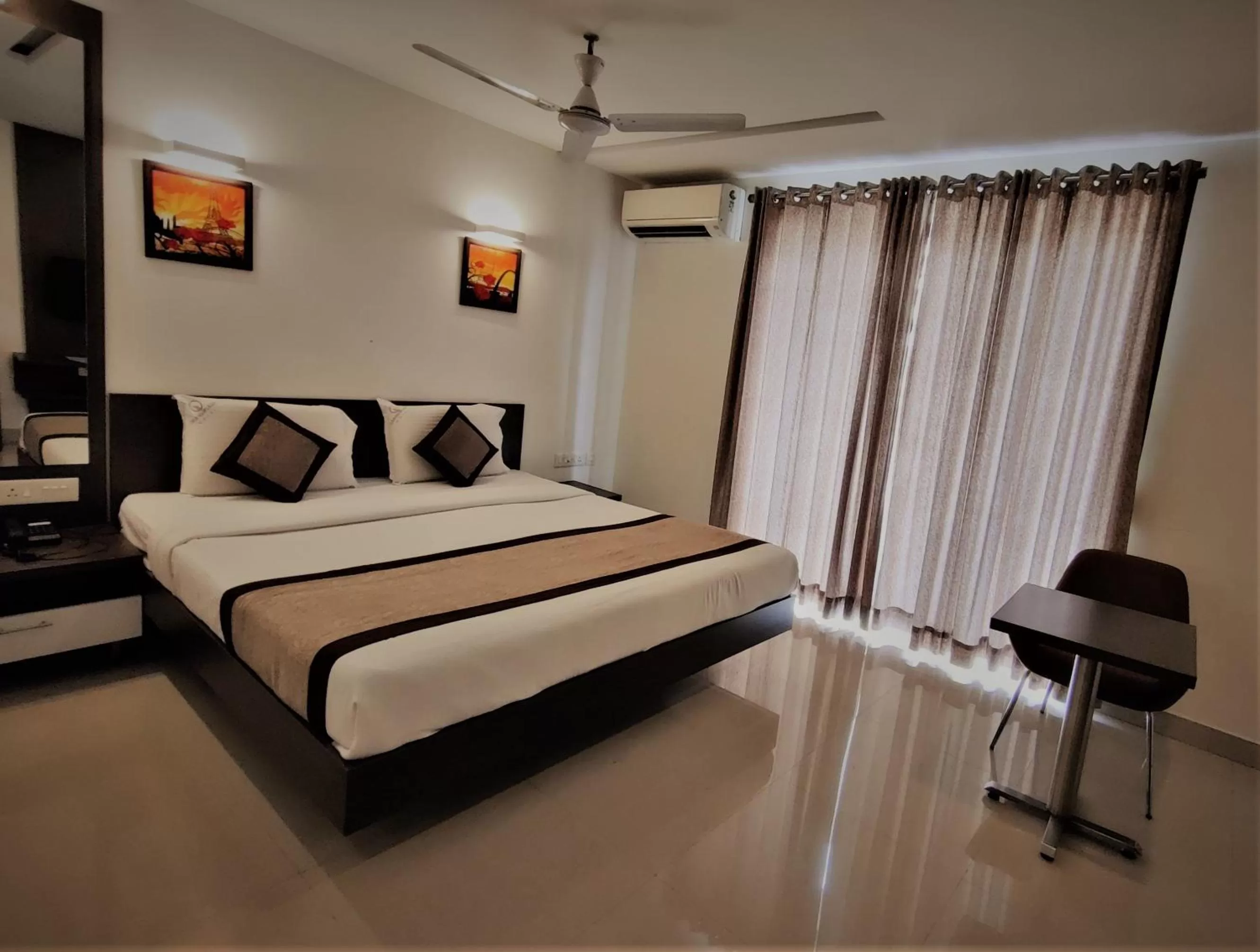 Bed in Grand Plaza Hotel