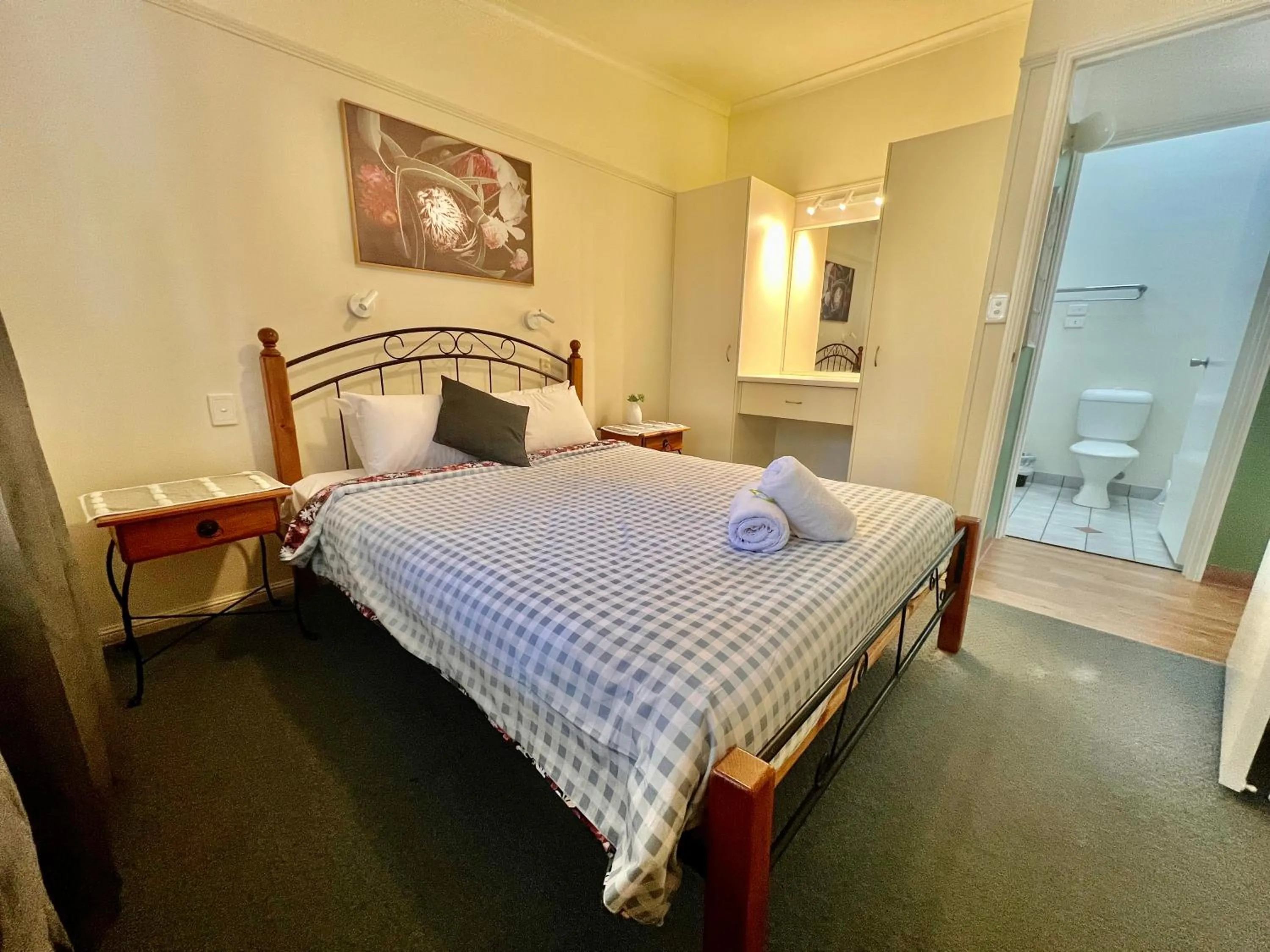 Bed in Colonial Village Resort