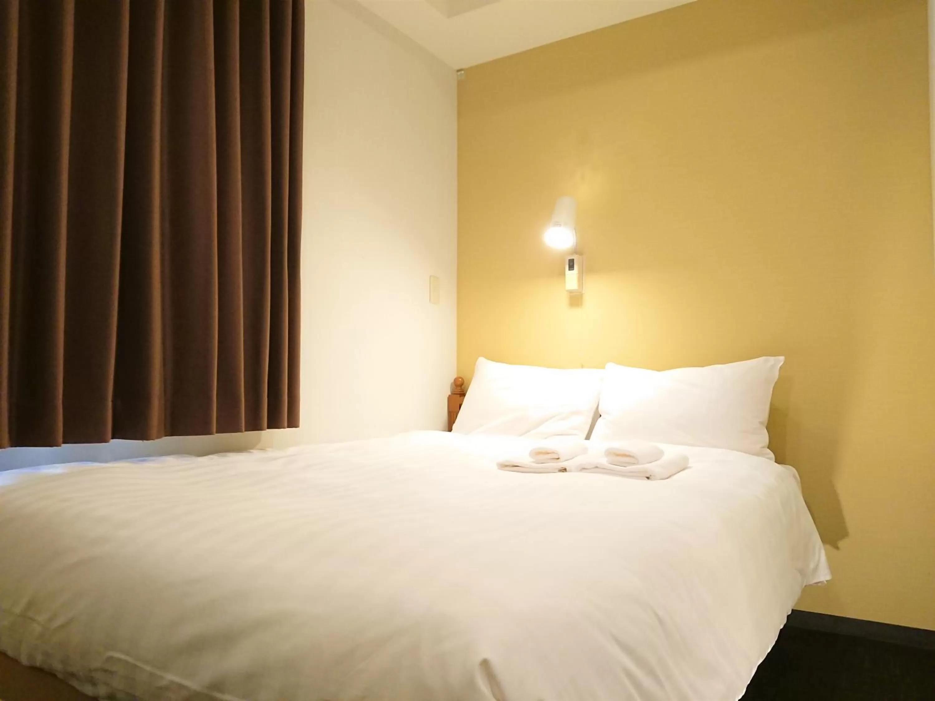 Photo of the whole room, Bed in Smile Hotel Kobe Motomachi