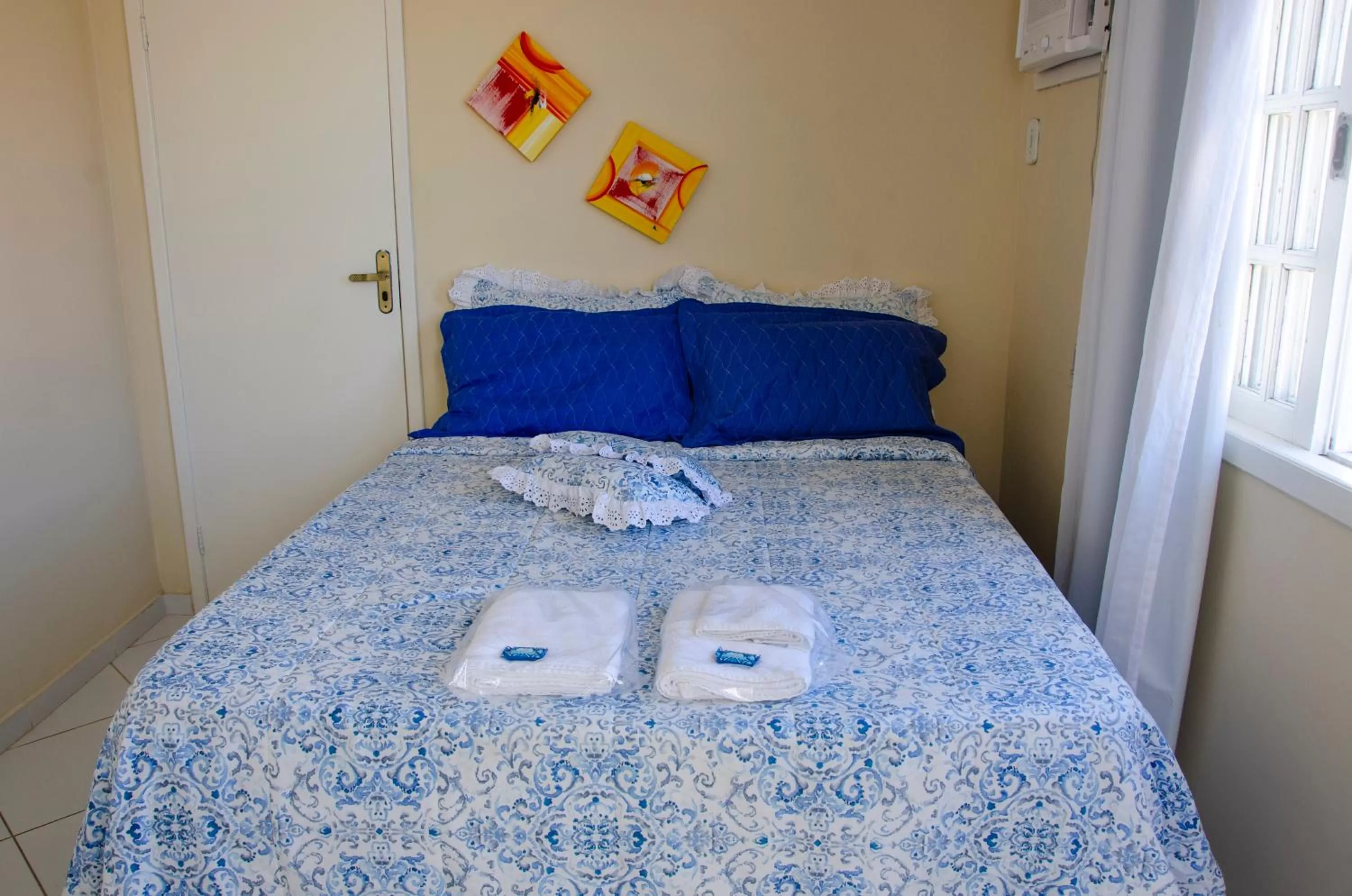 Bed in Pousada Luzes de Geribá