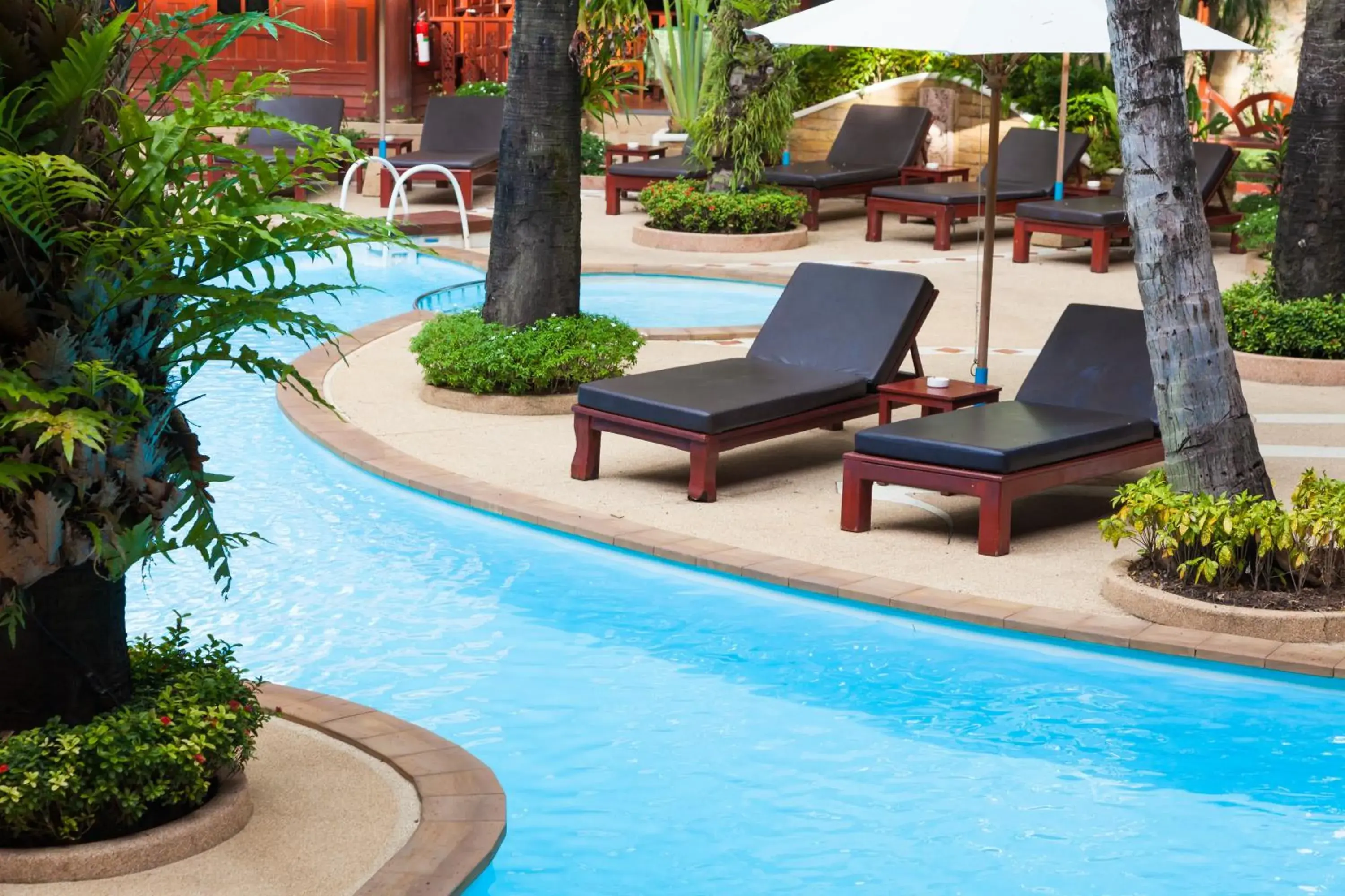 Deluxe Room with Balcony in Royal Phawadee Village Patong - 2 Minutes walk to the beach Deluxe Room with Balcony in Royal Phawadee Village Patong - 2 Minutes walk to the beach