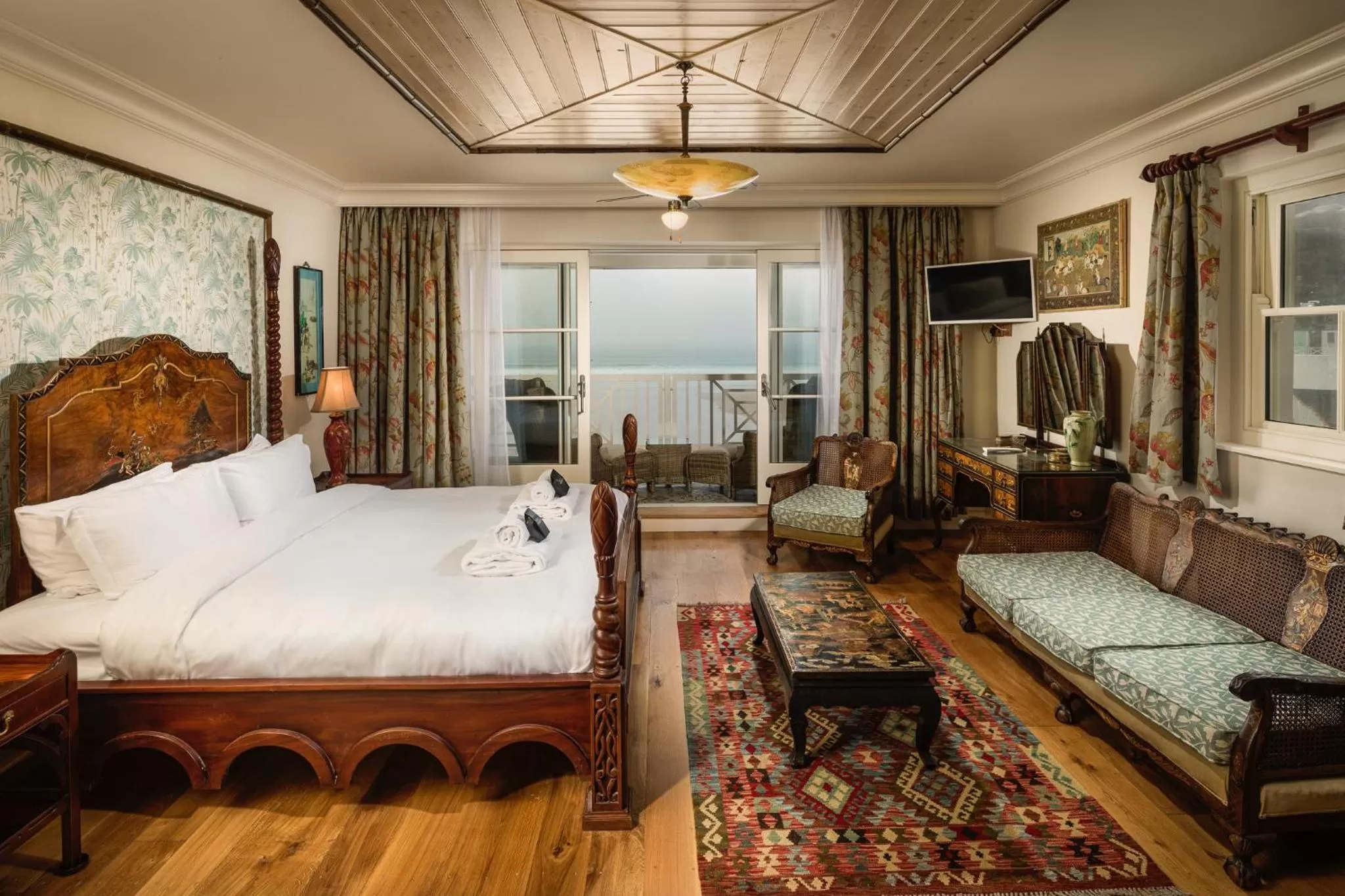 Bed in Tolcarne Beach Colonial Restaurant and Rooms