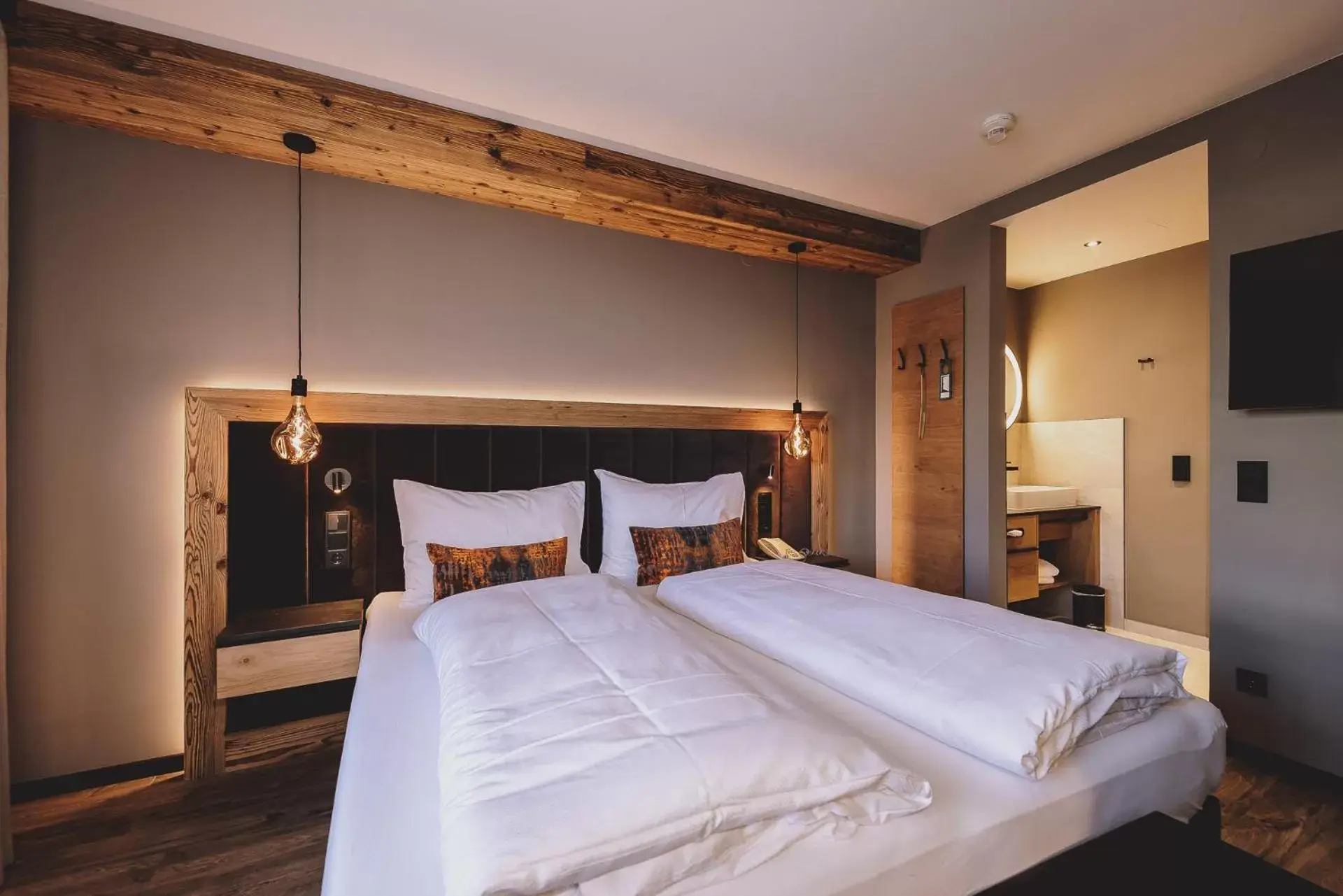 Deluxe Double Room with Balcony in POST POST Hotel - Alpine Boutique Hotel & Spa Deluxe Double Room with Balcony in POST POST Hotel - Alpine Boutique Hotel & Spa