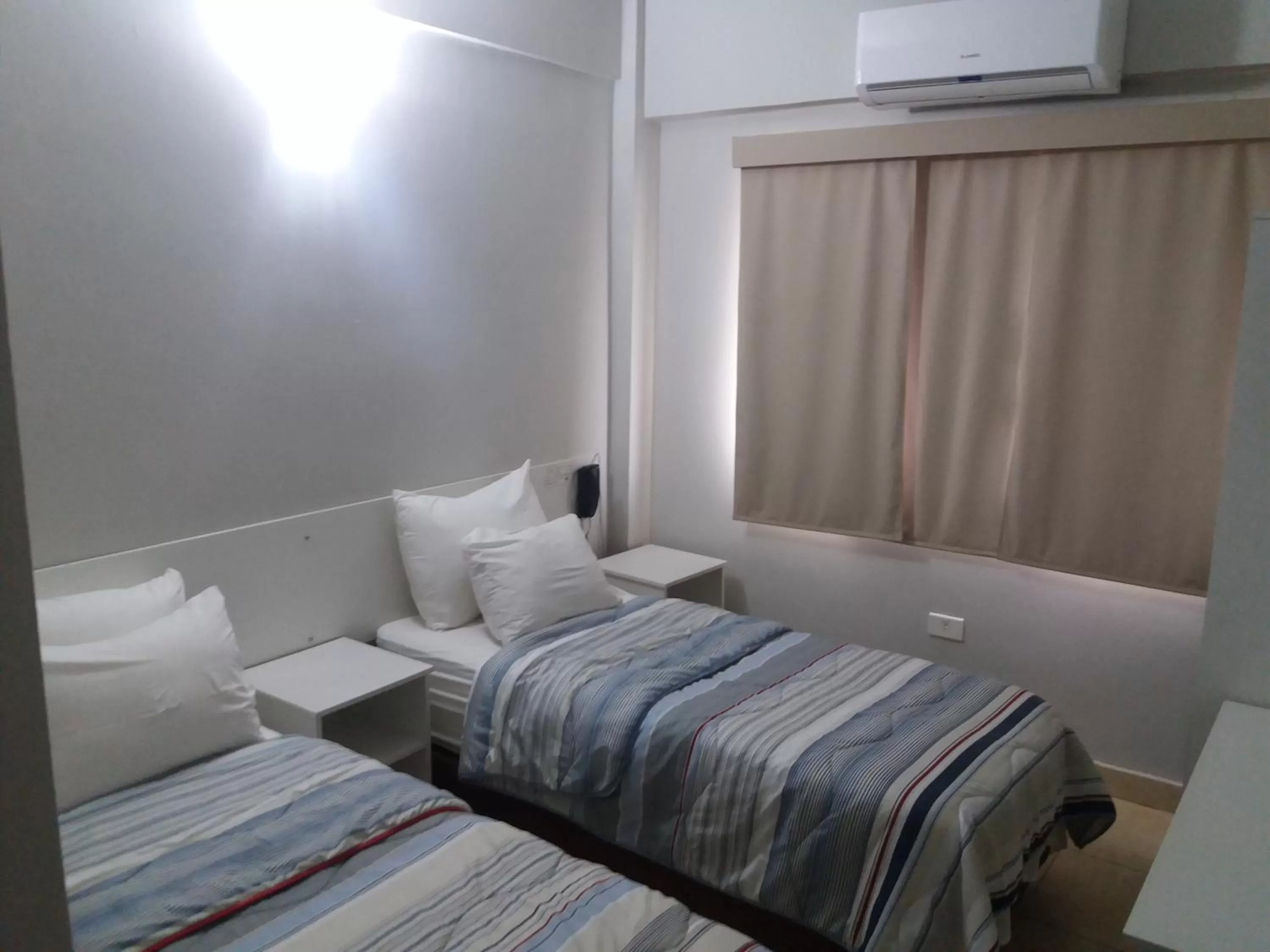 Bed in Madame Lynch Hotel Boutique