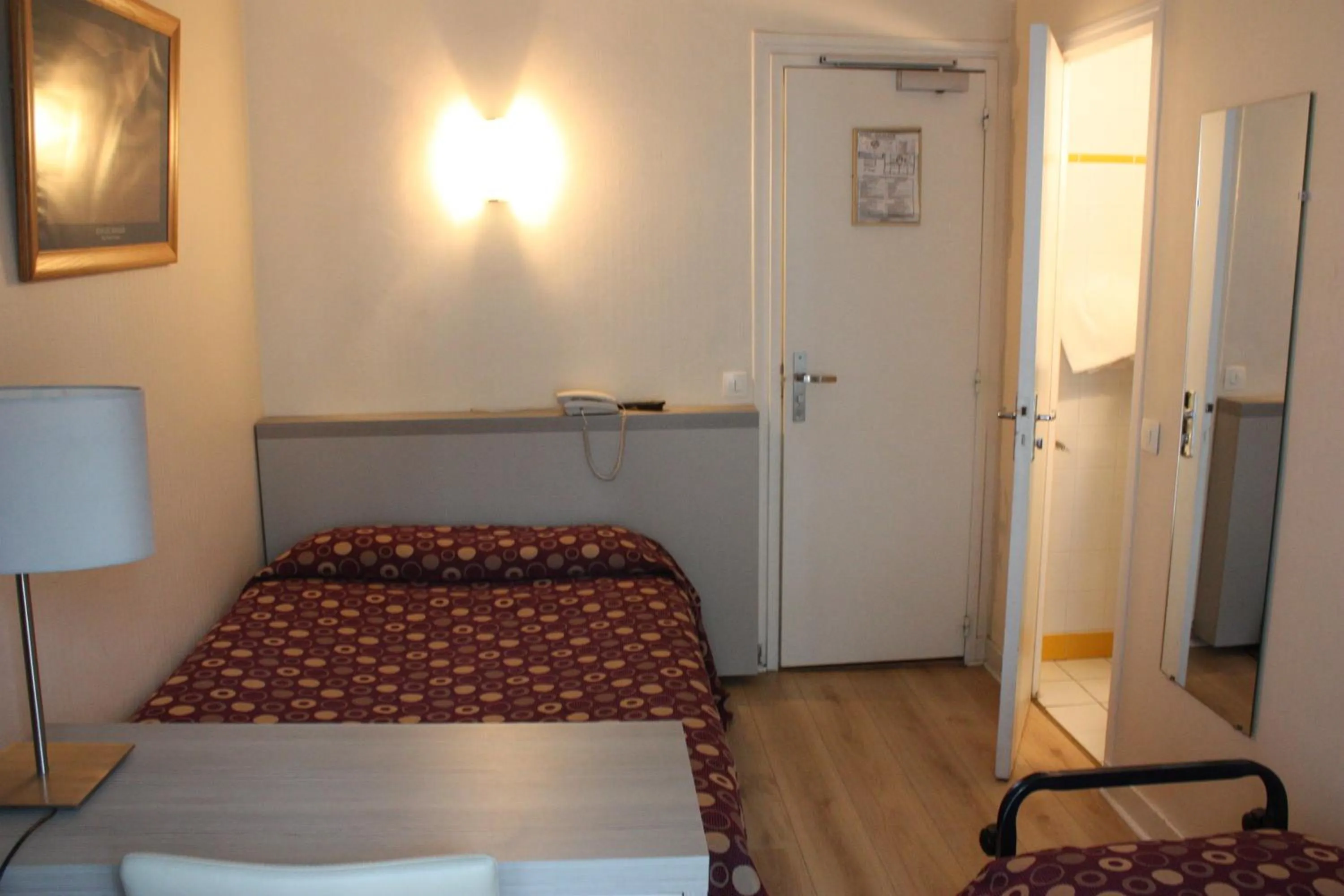 Bed in Hotel Excelsior