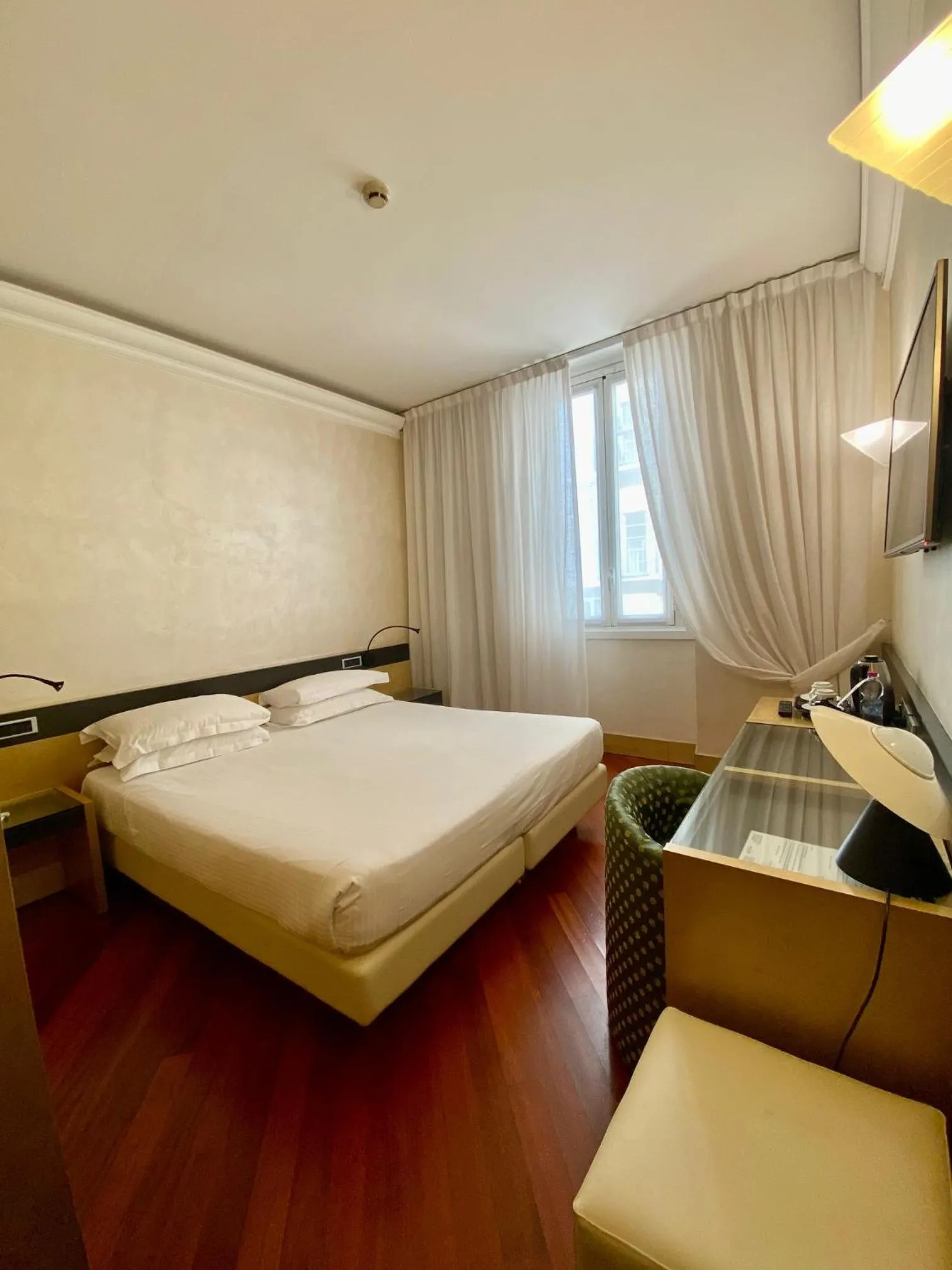 Bed in Hotel Sanpi Milano