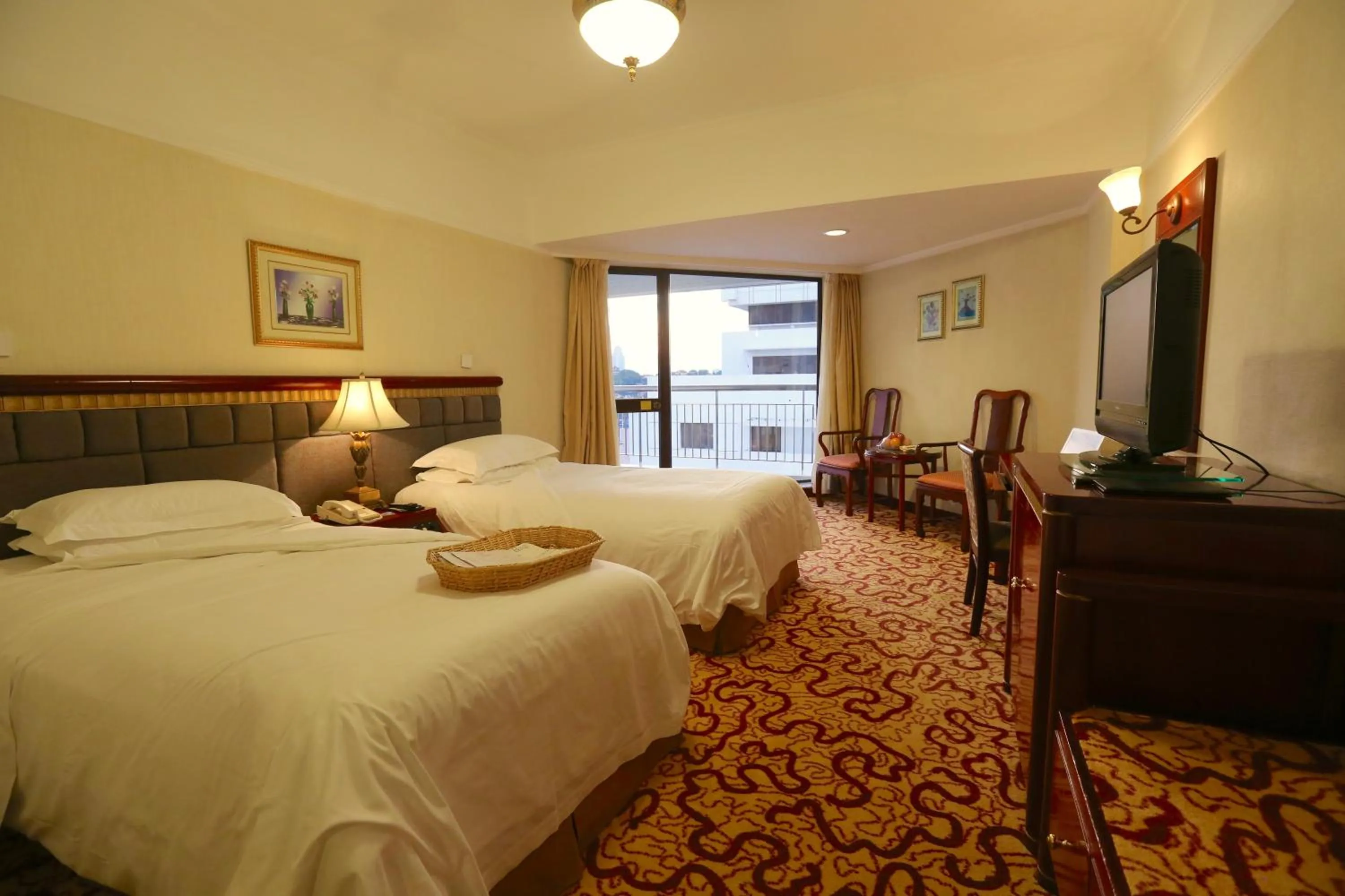 Bed in Huiquan Dynasty Hotel Qingdao