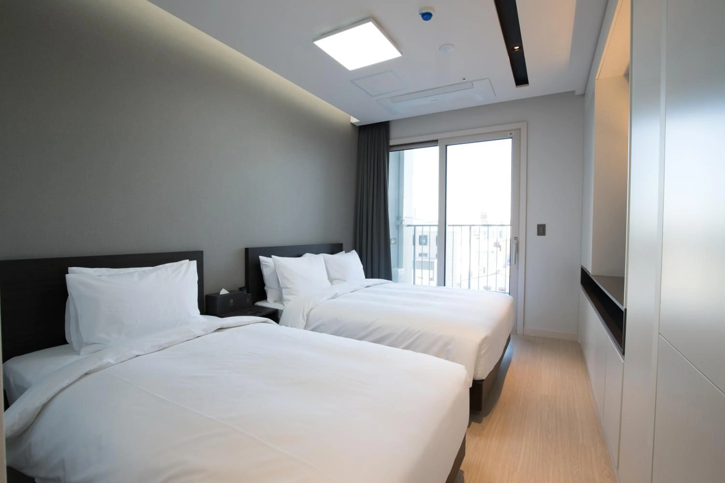 Bed in Sunrise Hotel Sokcho