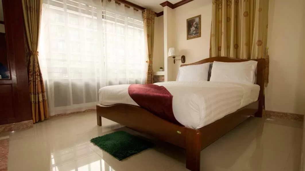 Bed in Bluebird Inn Pattaya