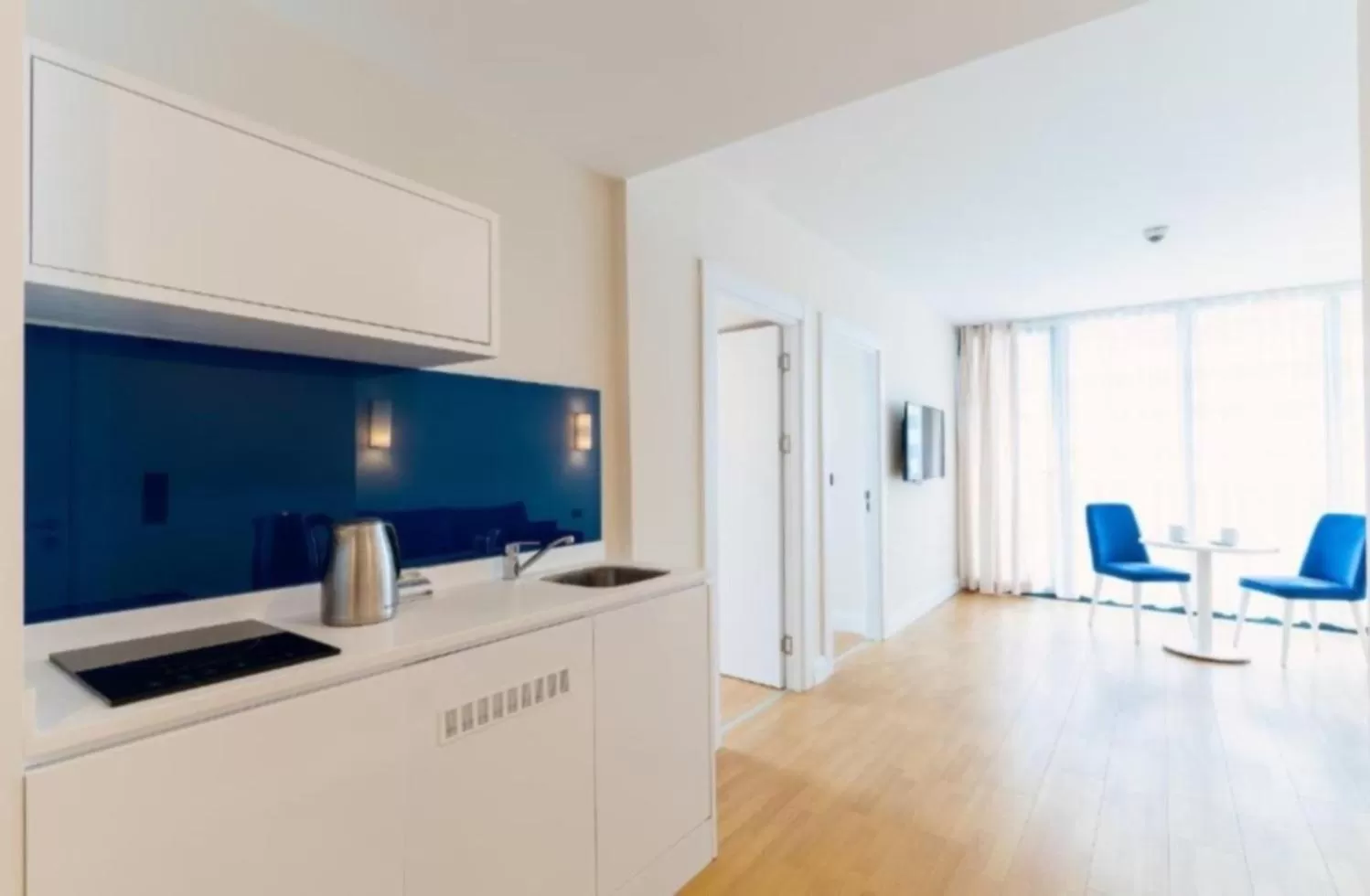 Kitchen or kitchenette, TV/Entertainment Center in Batumi Orbi City Wonderful Sea View