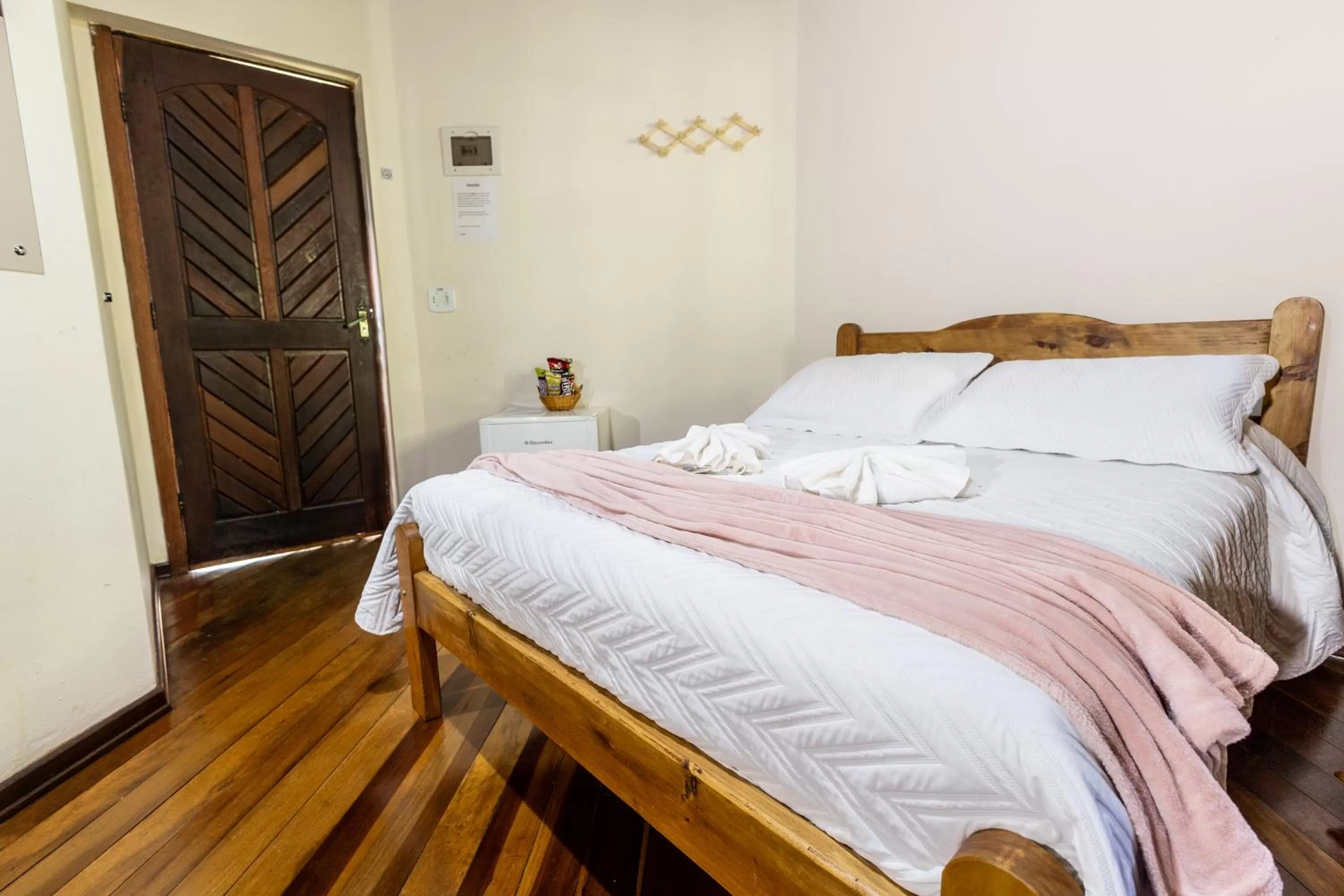 Bed in Chalés 3 Pinheiros