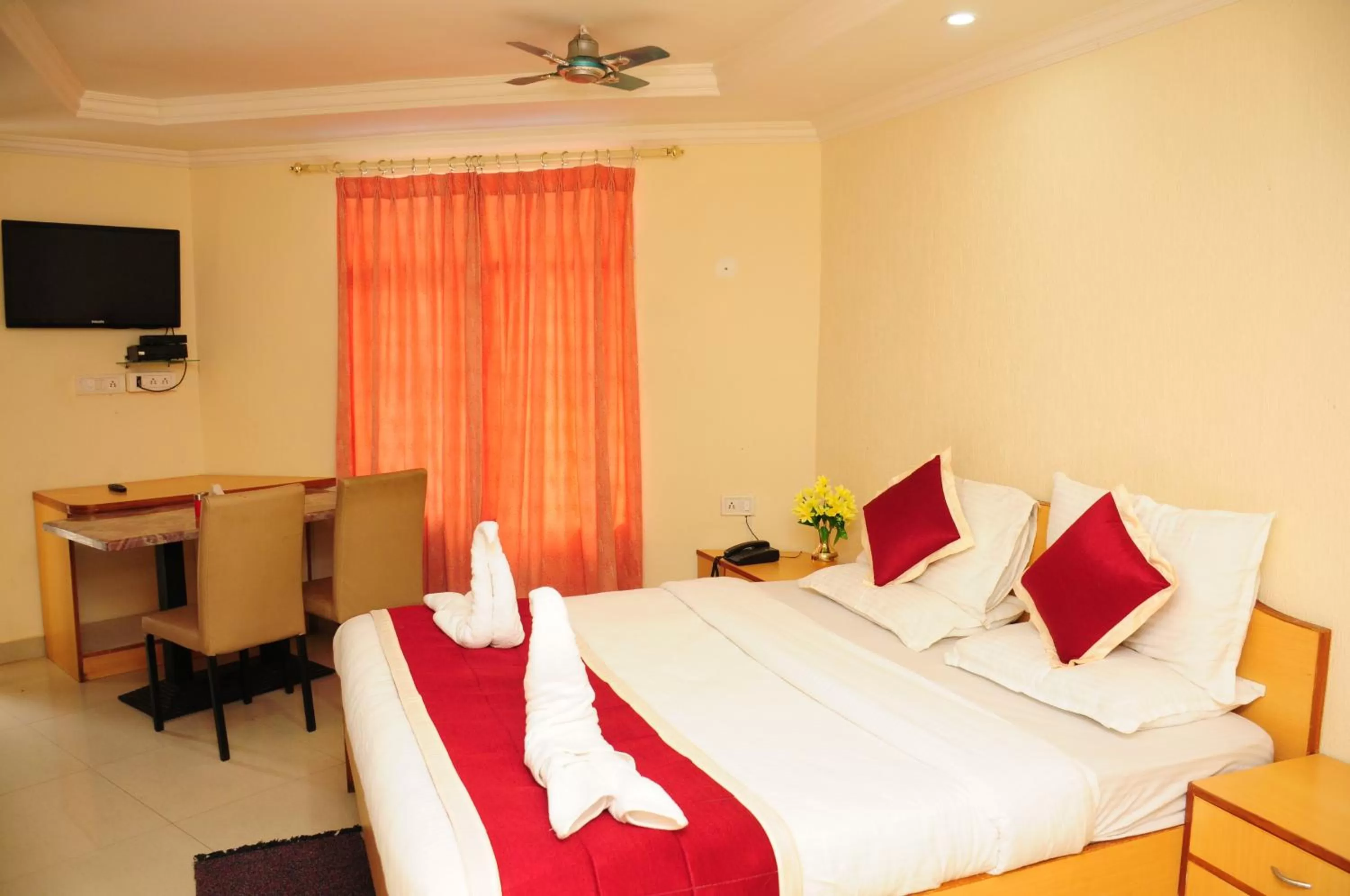 Bed in KSTDC Hotel Mayura Nisarga Pearl Valley