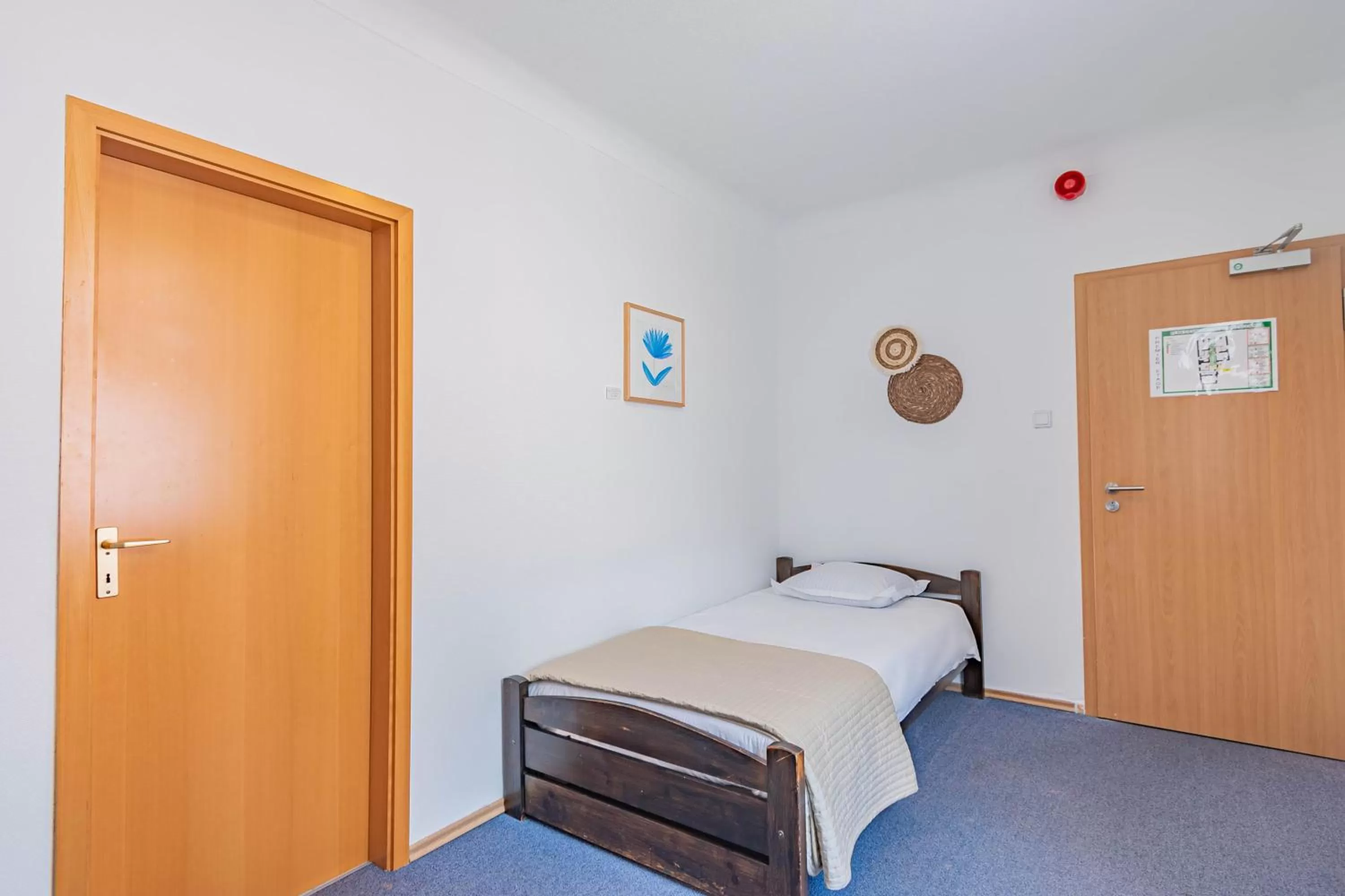 Bed in Hôtel Le Petit Poète