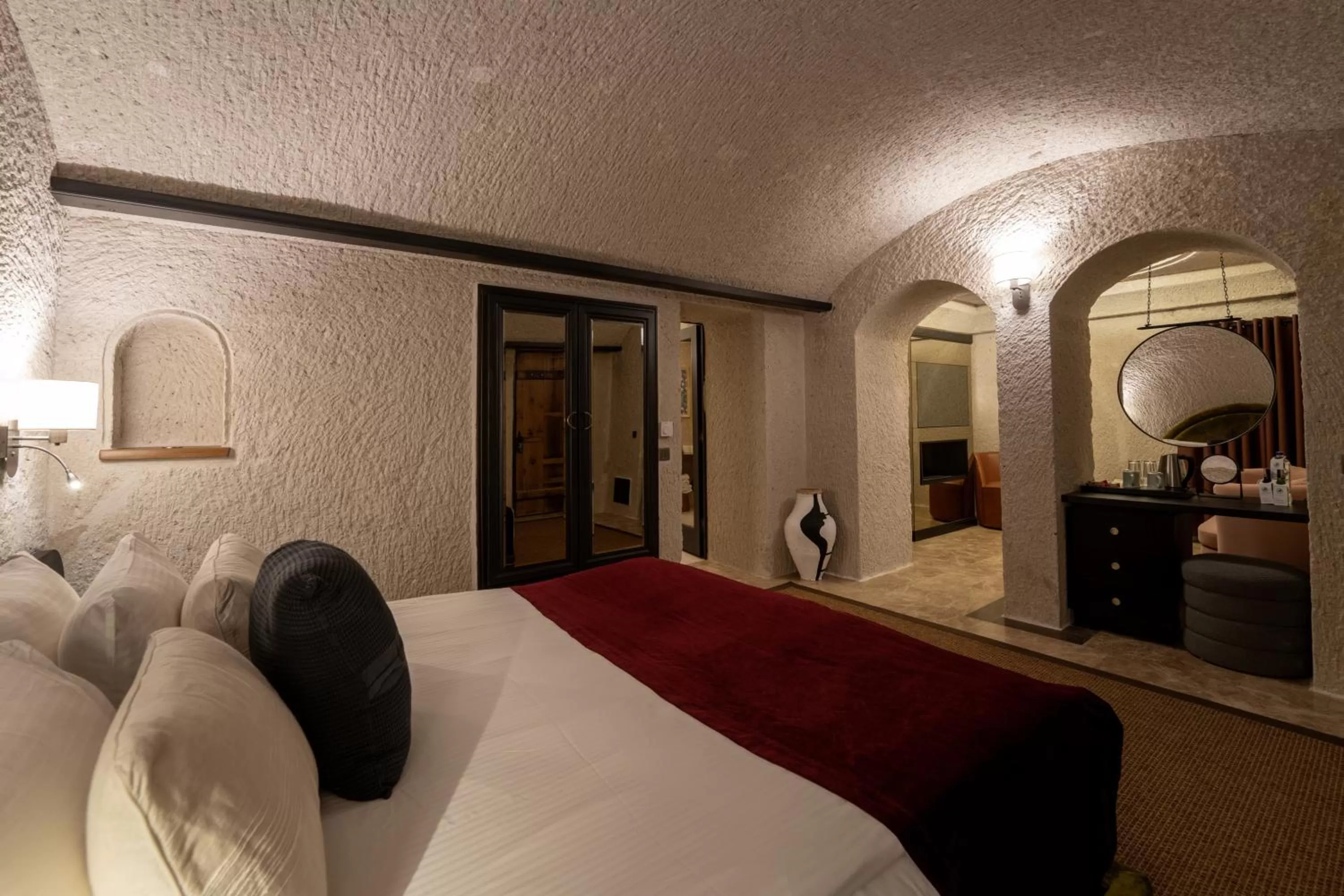 Bedroom, Bed in Artemis Cave Suites & Spa- Adults Only