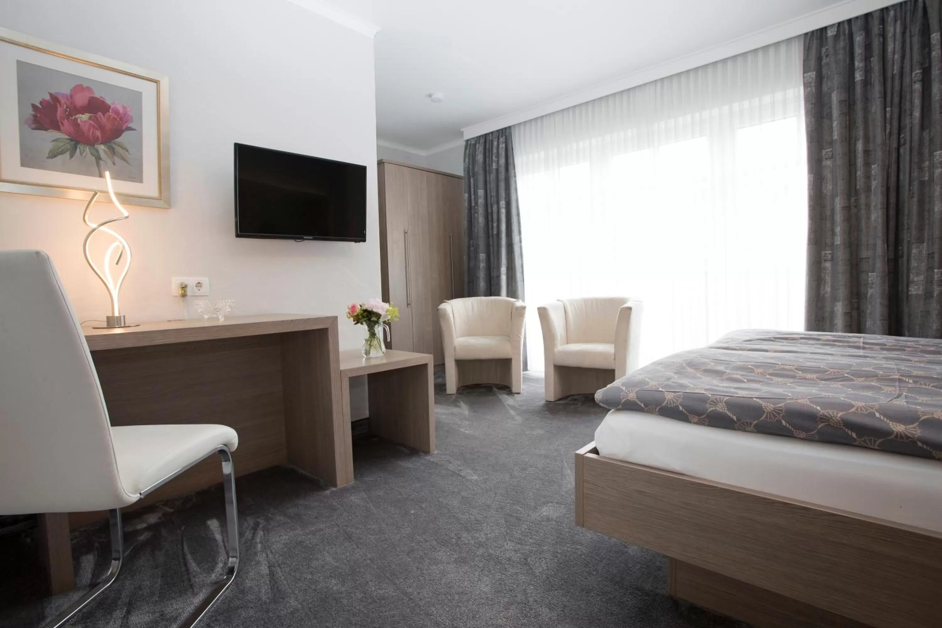 Garden view, Bed in Hotel Forsthaus