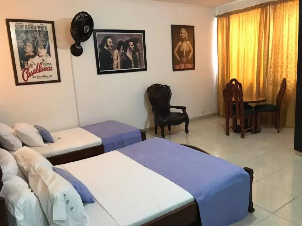 Bed in Arco Apartasuites