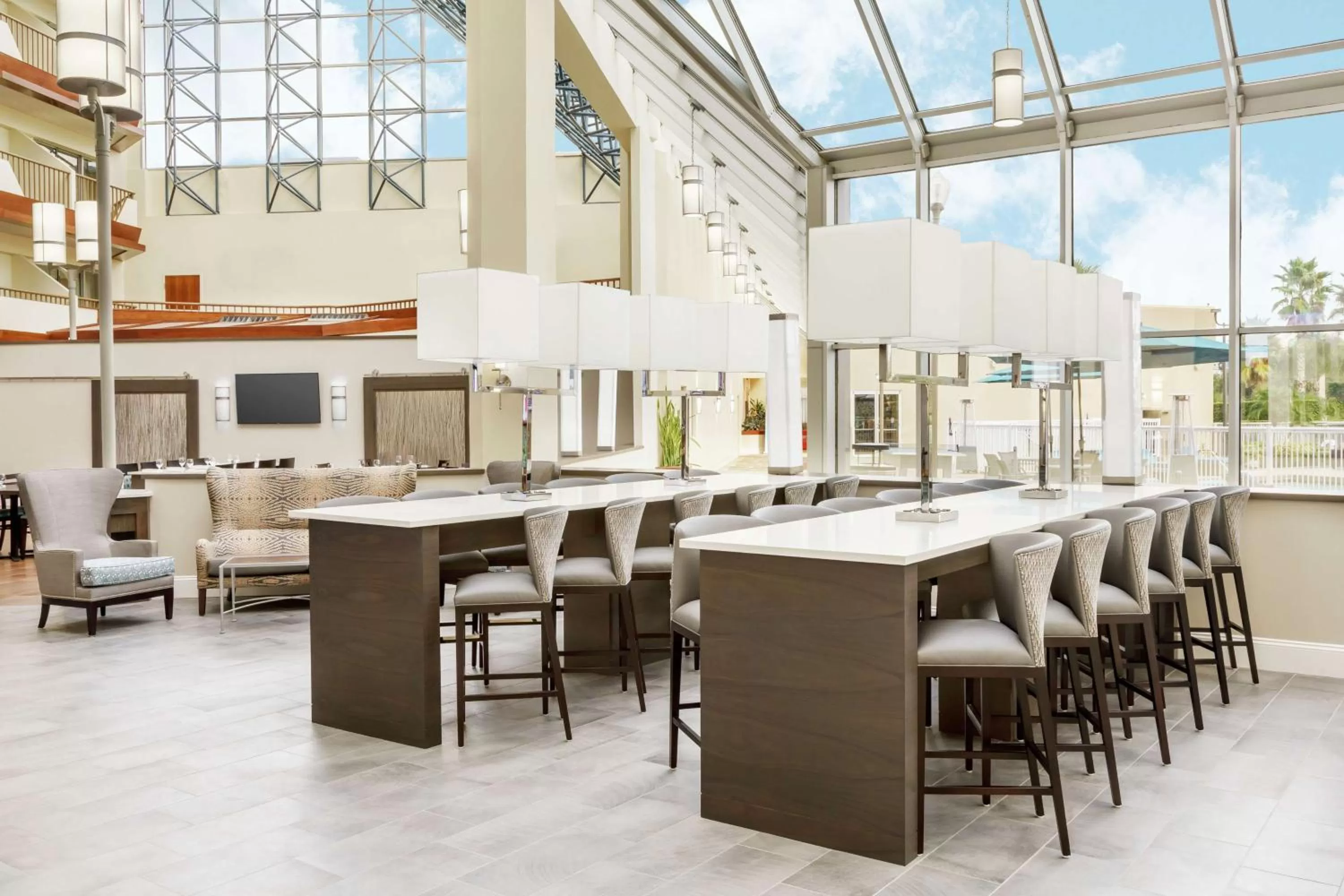 Lobby or reception in DoubleTree by Hilton Orlando Airport Hotel