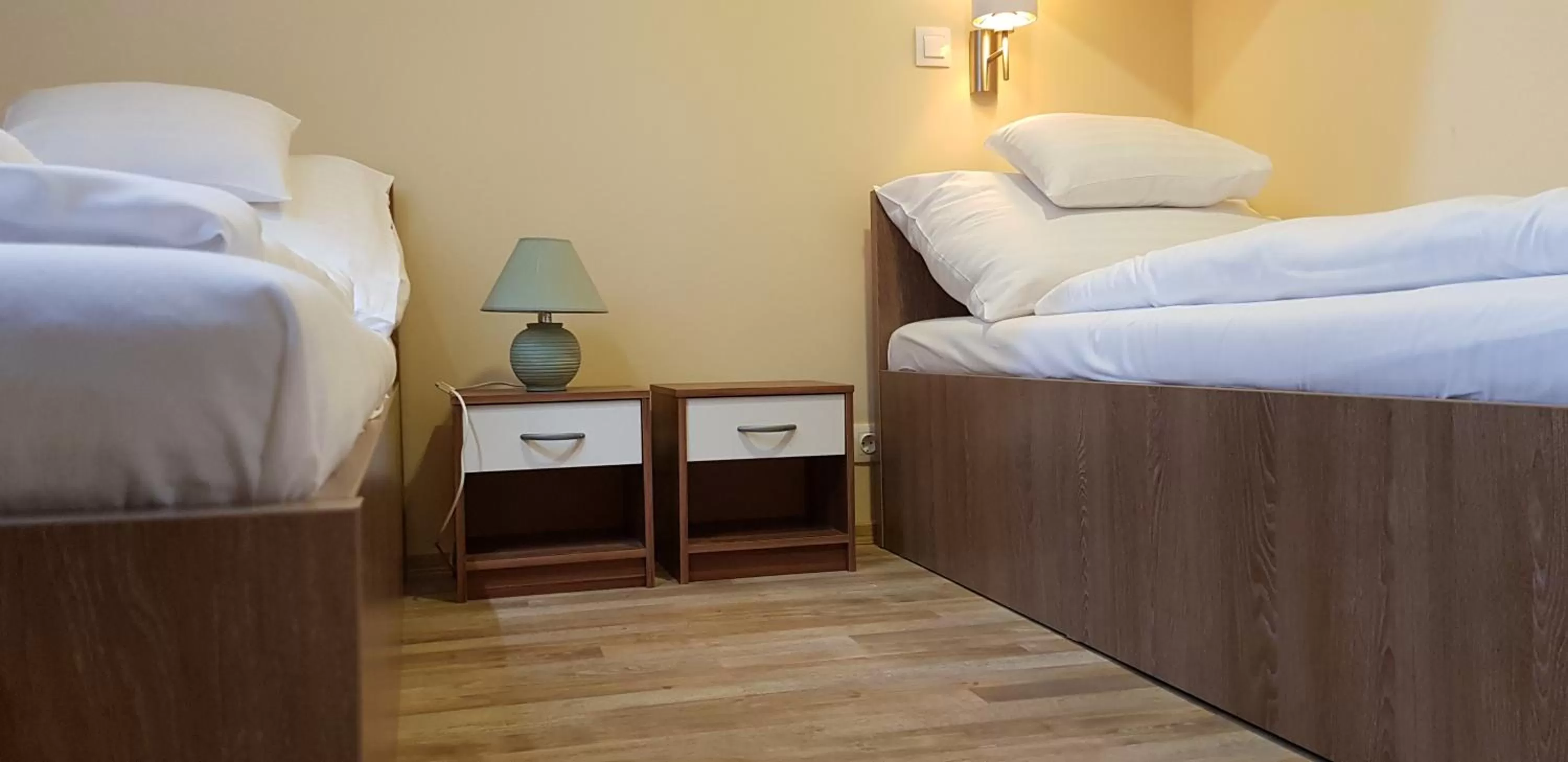 Bed in Central Panzió Gyula