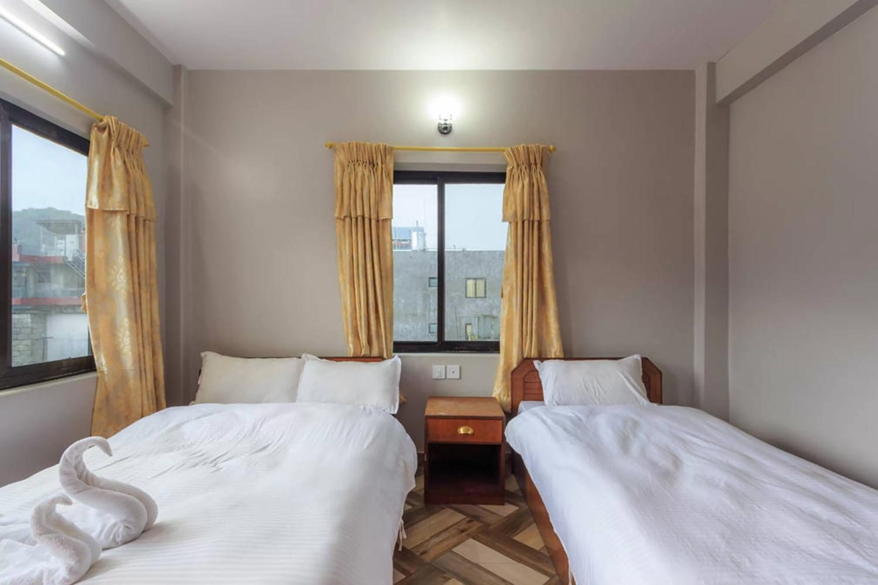 Bed in Hotel Immortal Inn