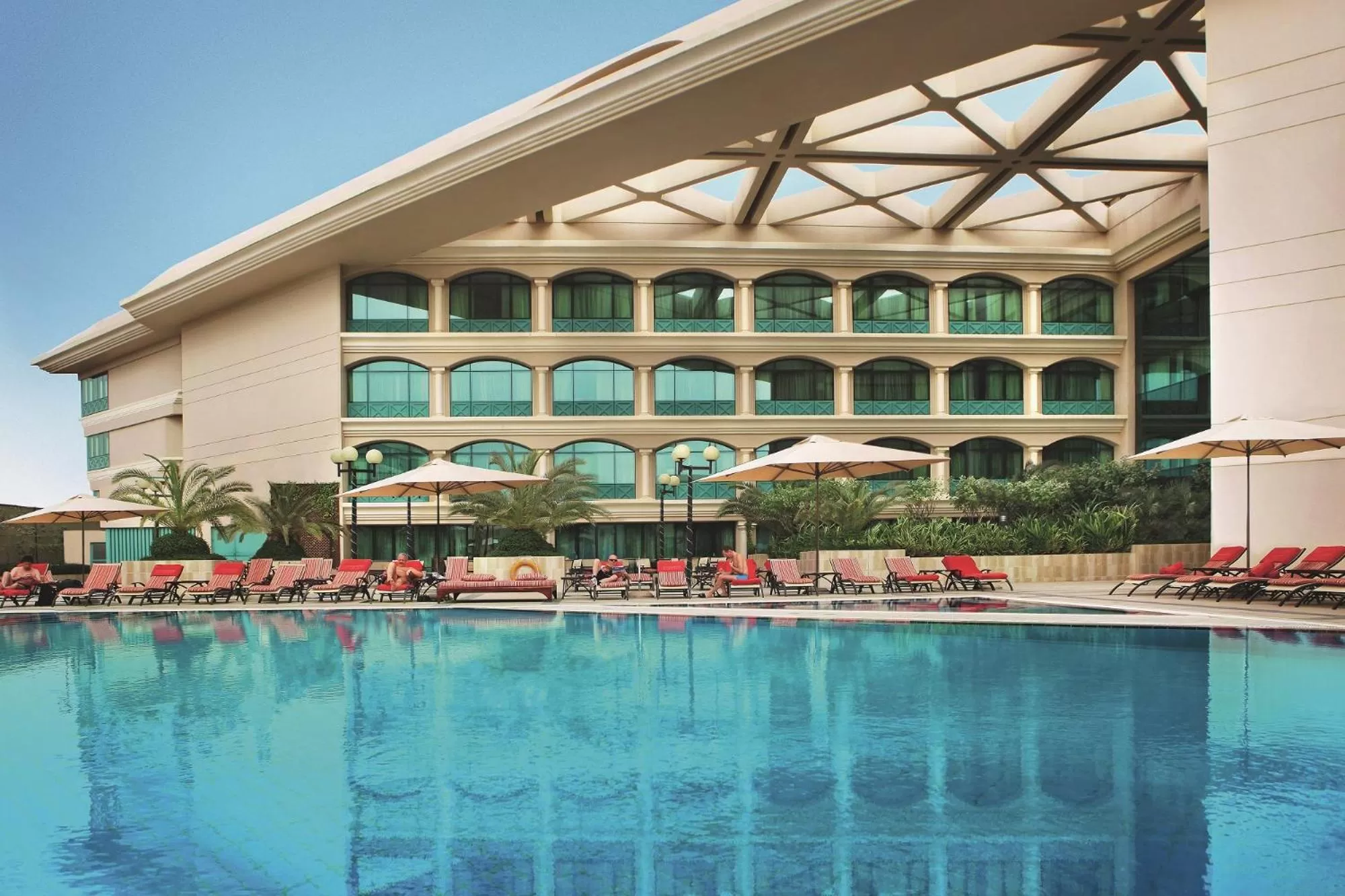 Swimming pool in Mövenpick Grand Al Bustan
