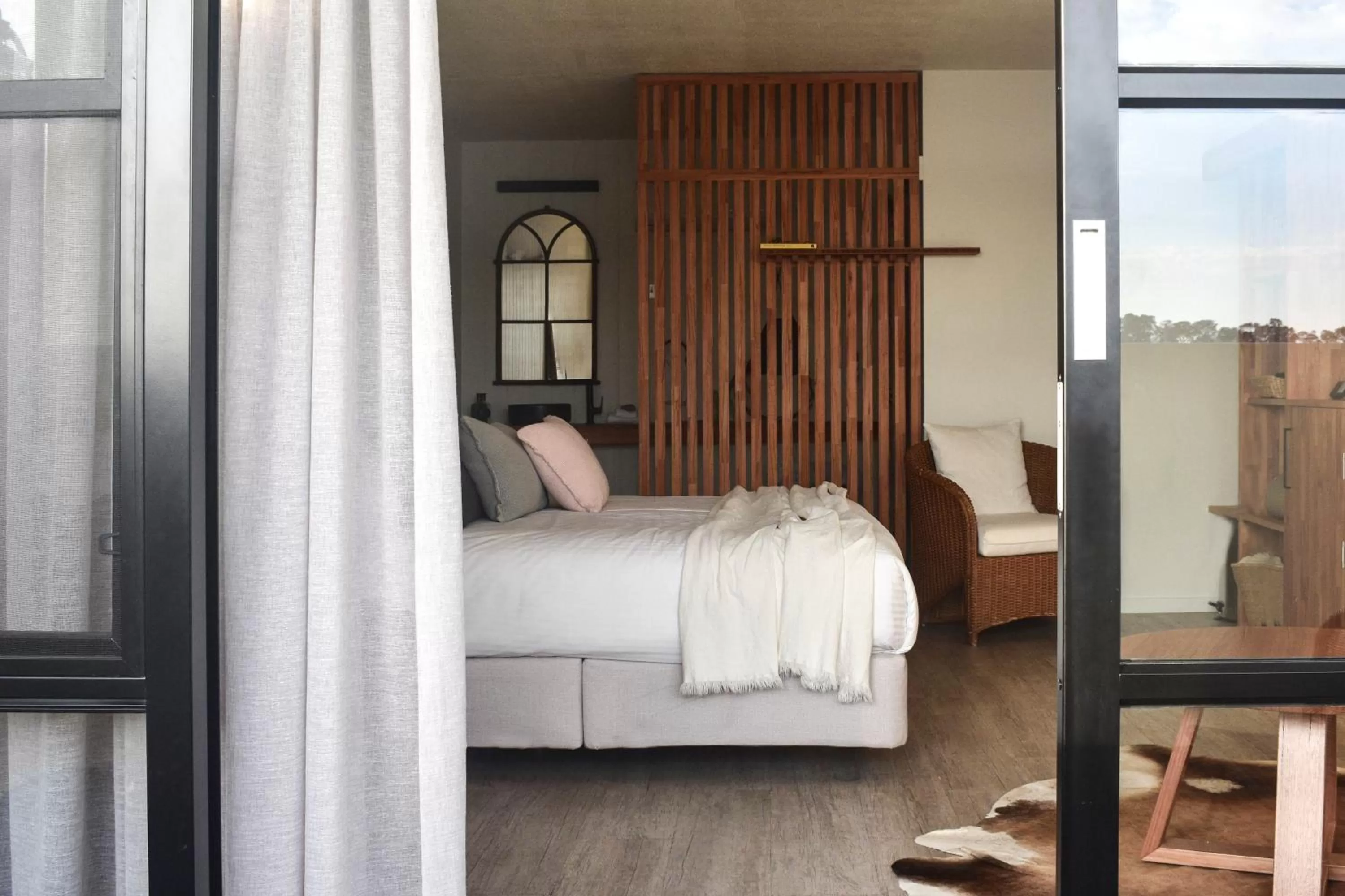 Bed in Bay Breeze Boutique Accommodation