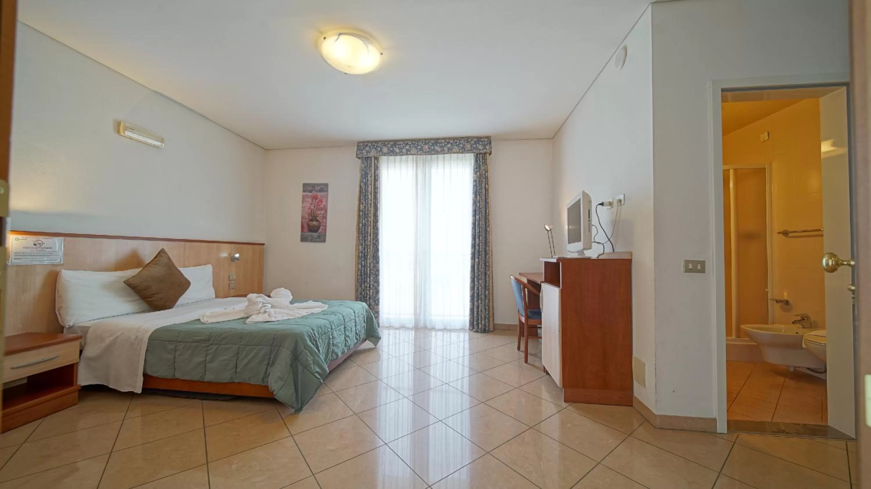 Comfort Quadruple Room in Hotel Nuovo Sole HNS