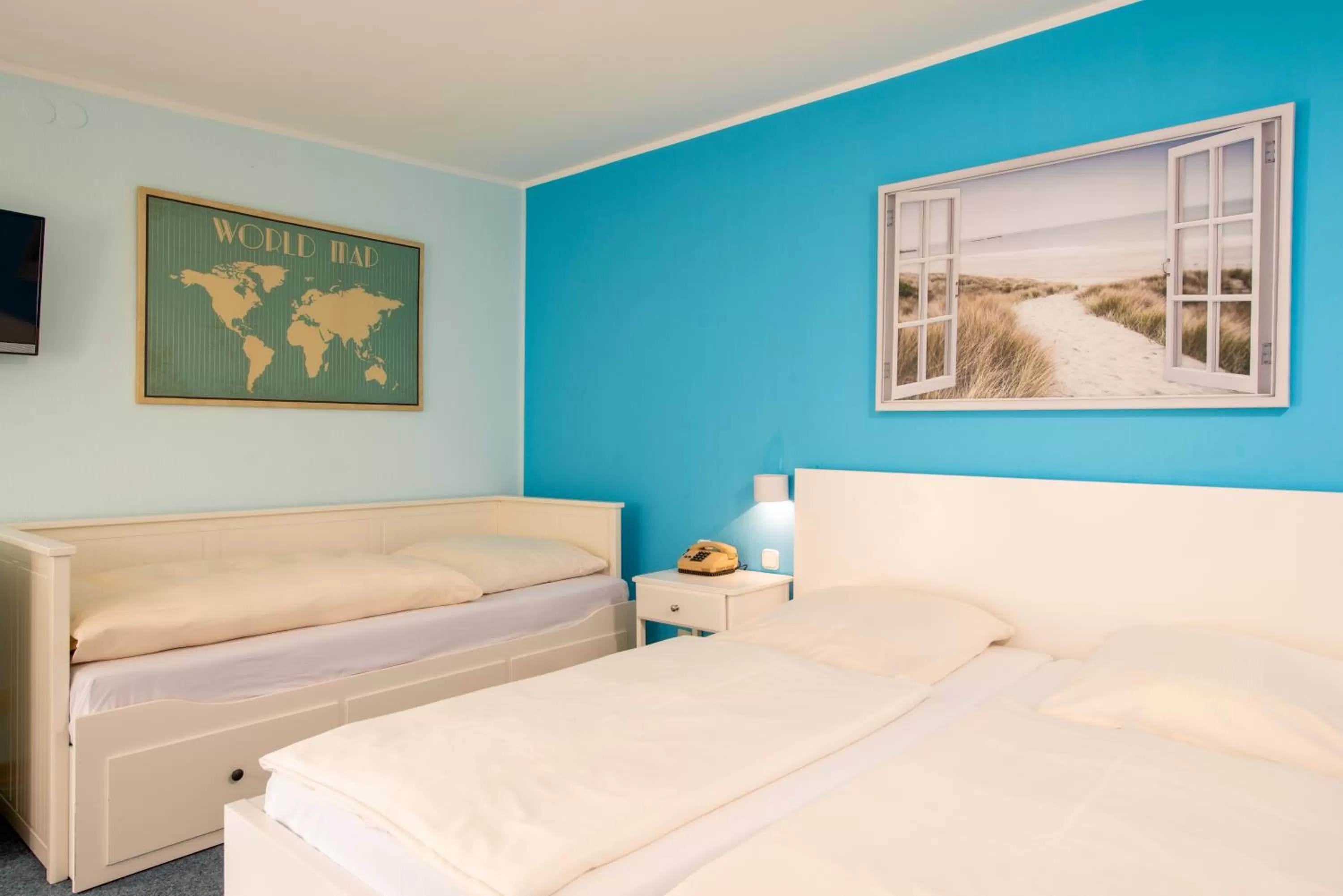 Bed in Hotel Heldt Dependance