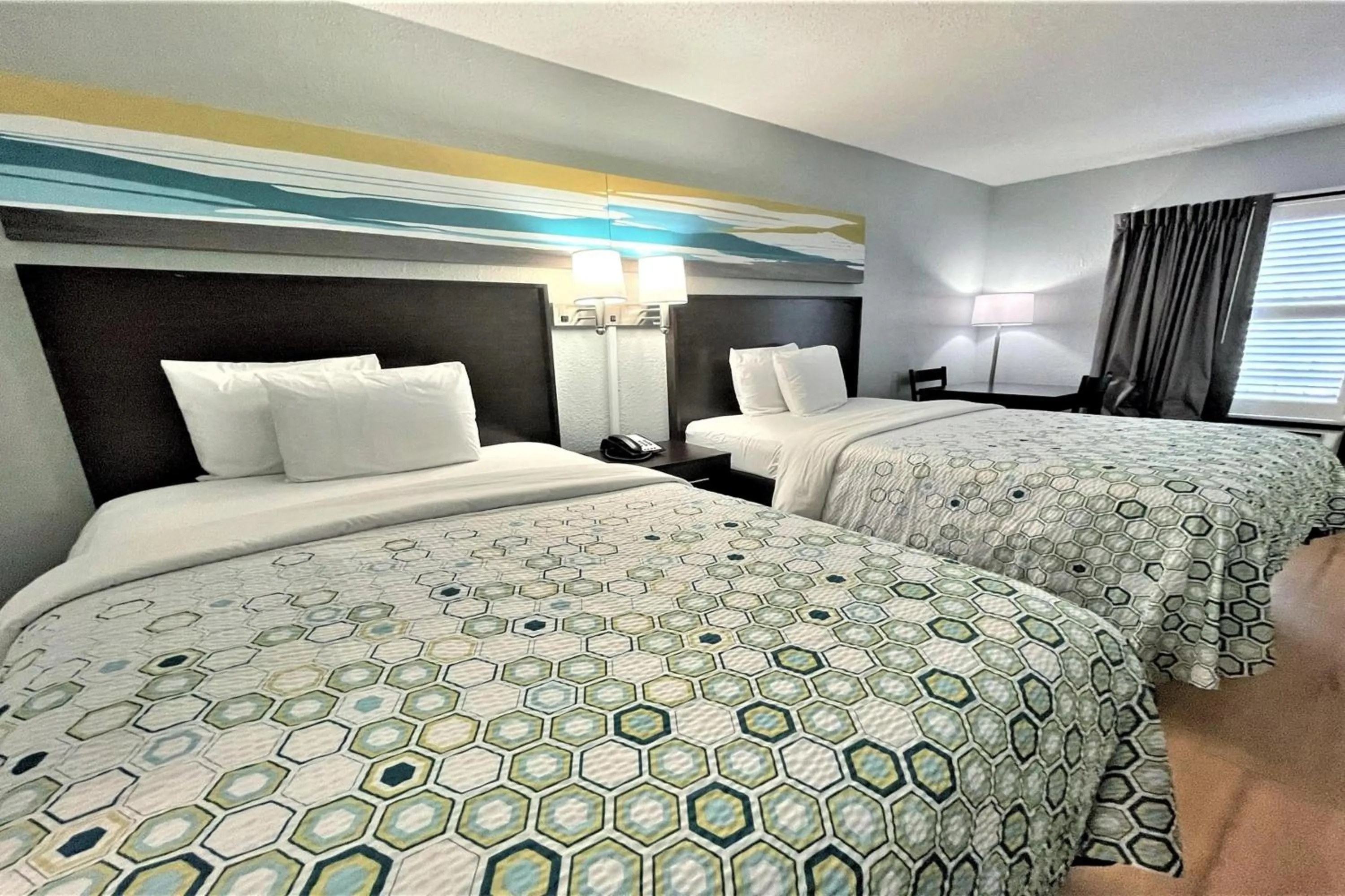 Bedroom, Bed in HomeTowne Studios by Red Roof Augusta